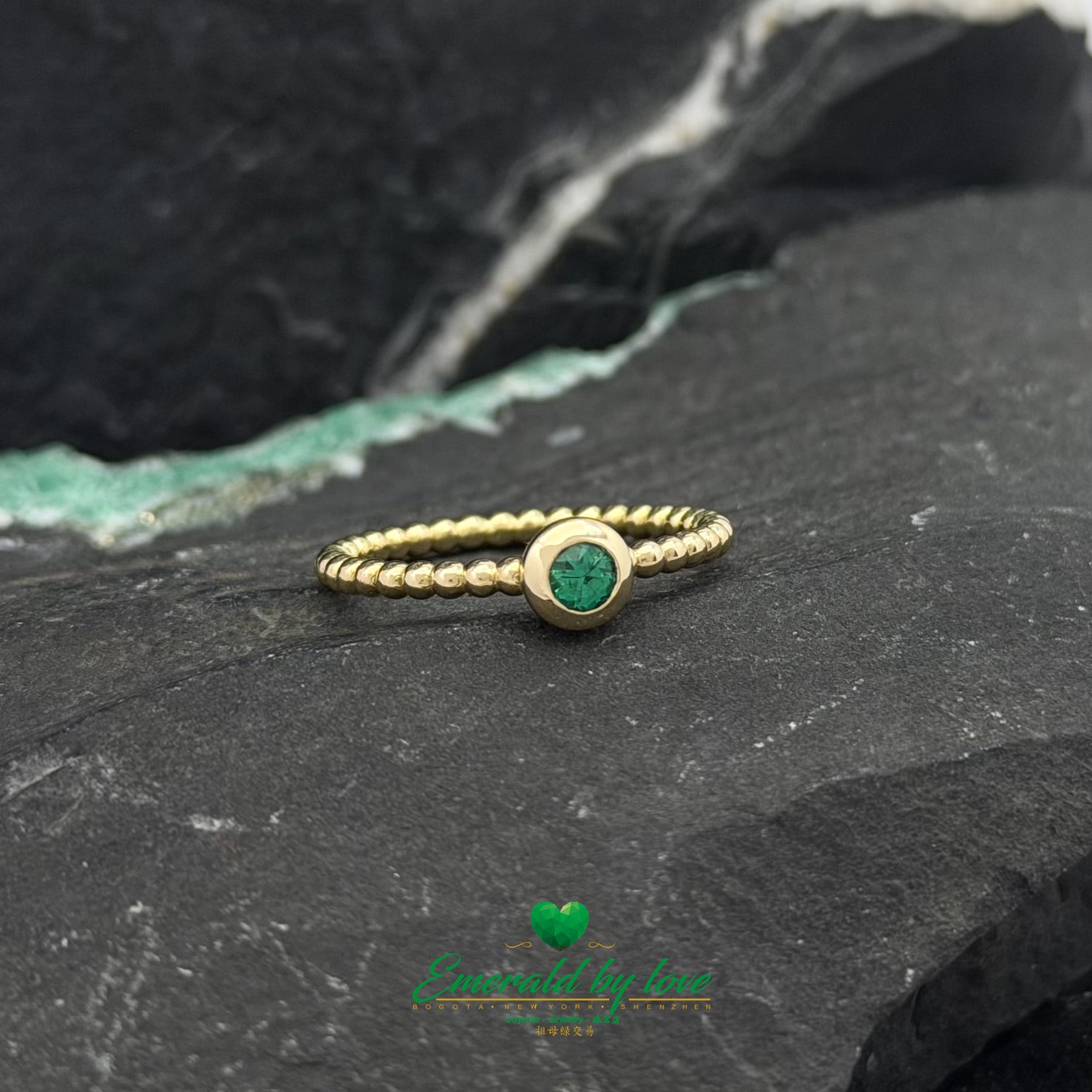 Delicate Bezel-Set Ring with Round Emerald