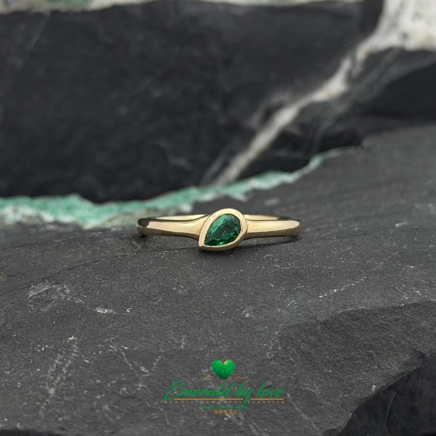 Delicate Bezel-Set Pear Emerald Ring