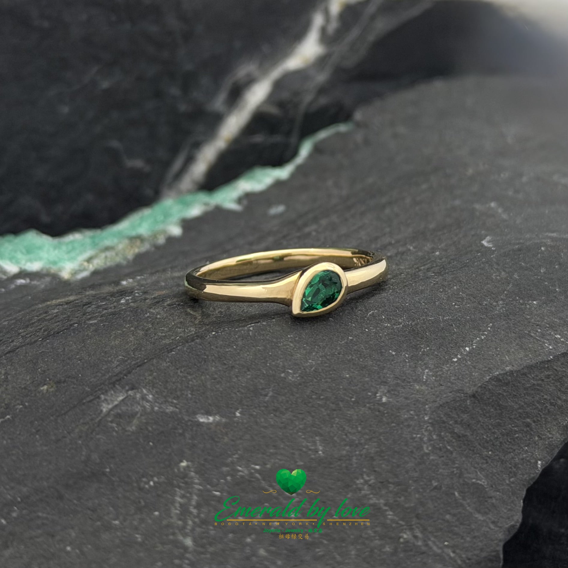 Delicate Bezel-Set Pear Emerald Ring
