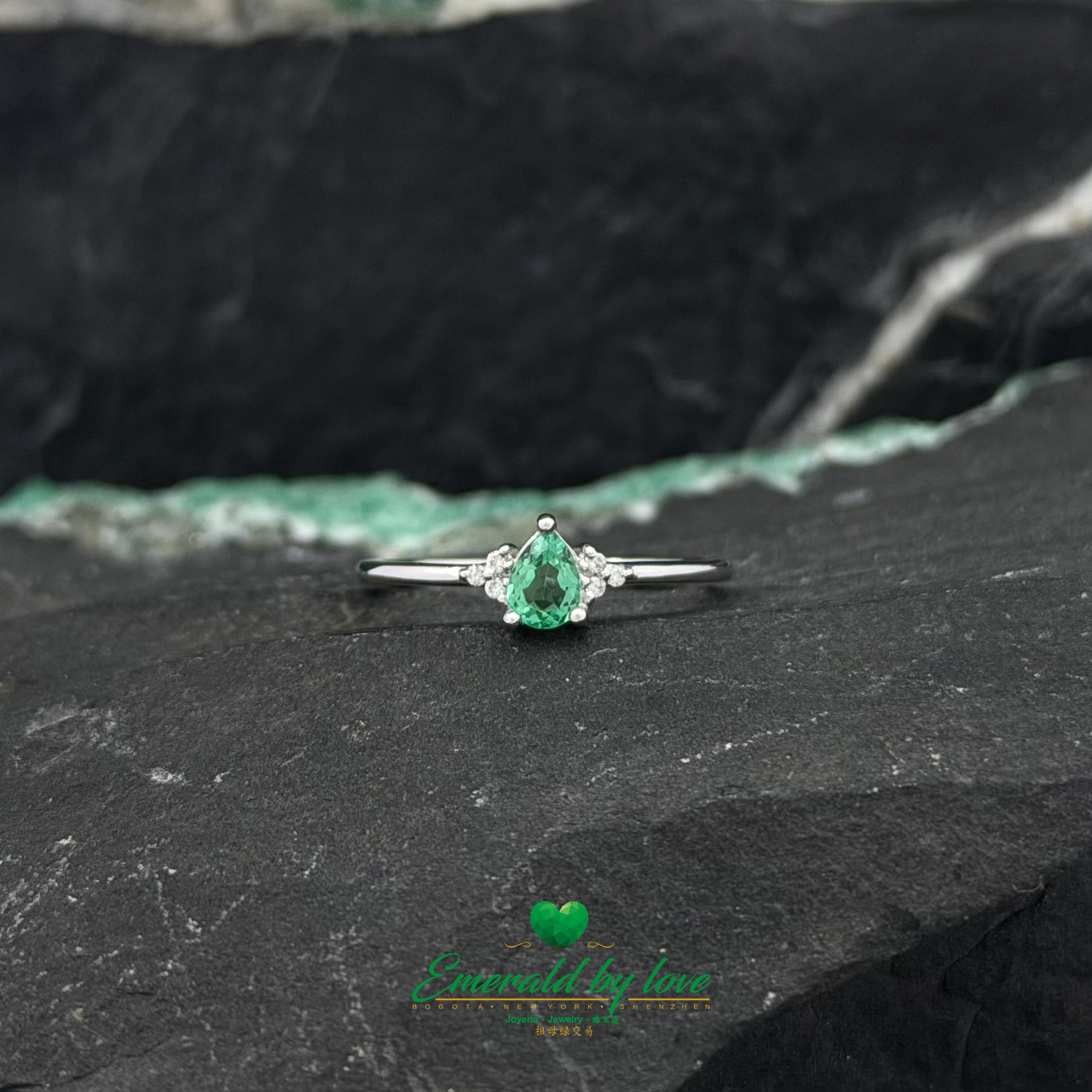 White Gold Pear Emerald Ring with Diamond Accents