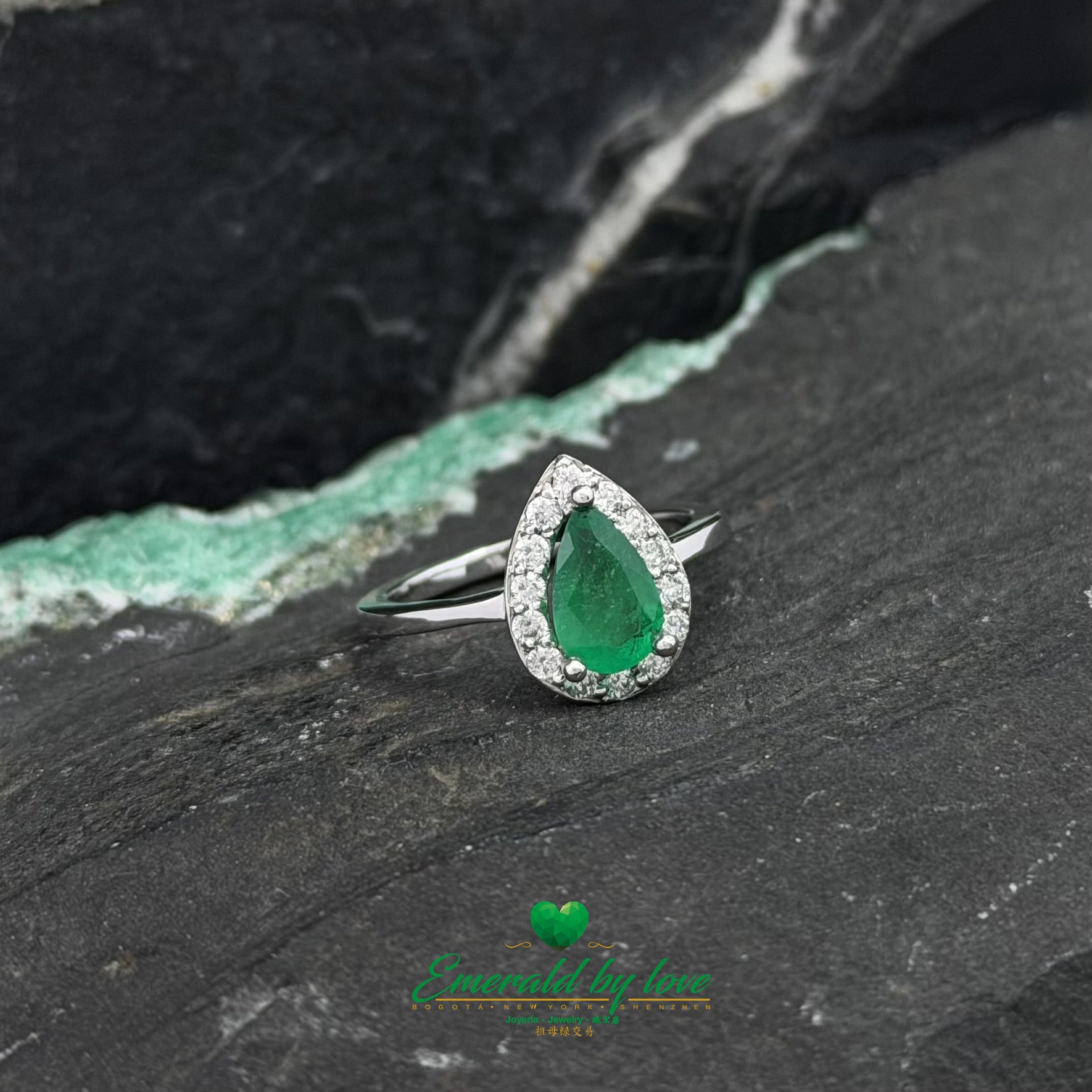 Pear-Shaped Emerald Cluster Ring with Diamonds