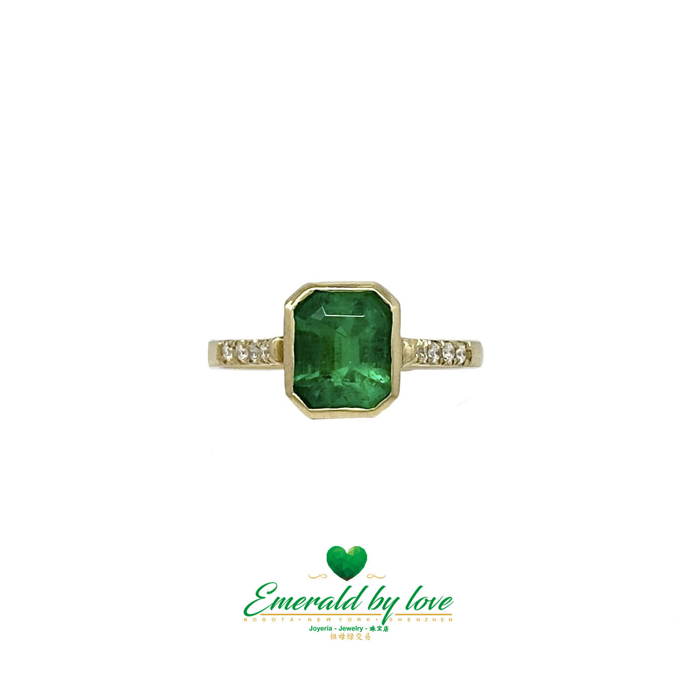 Elegant Bezel-Set Emerald-Cut Emerald Engagement Ring with Diamond Band