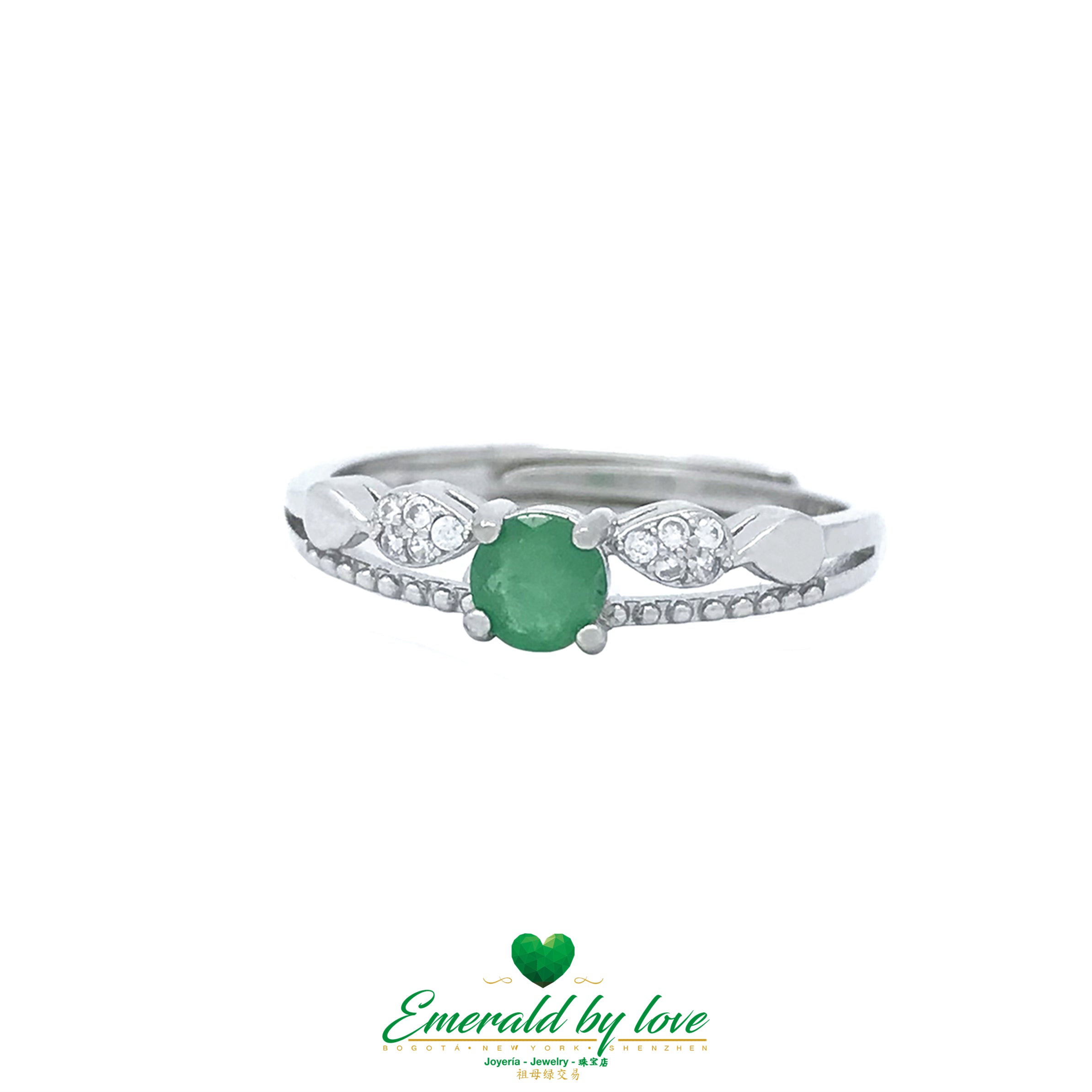 Bague double avec émeraude centrale ronde et motif nœud en zircone