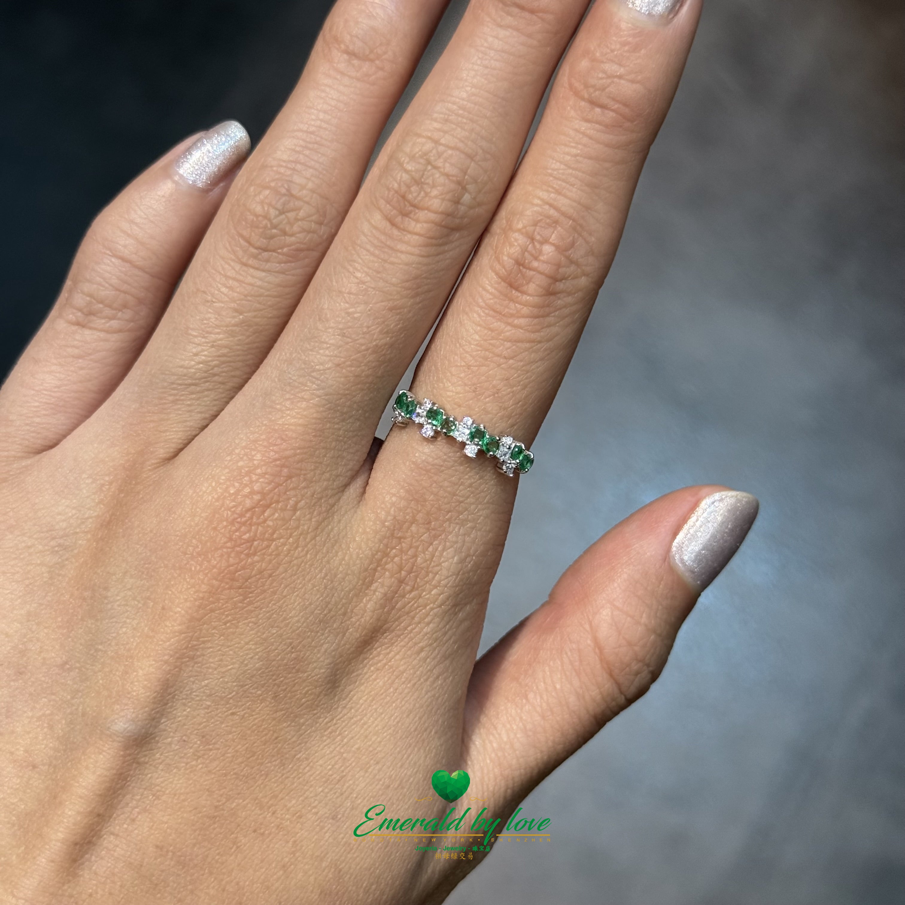 Sterling Silver Crazy Band Ring with Two Emeralds and Scattered Cubic Zirconia