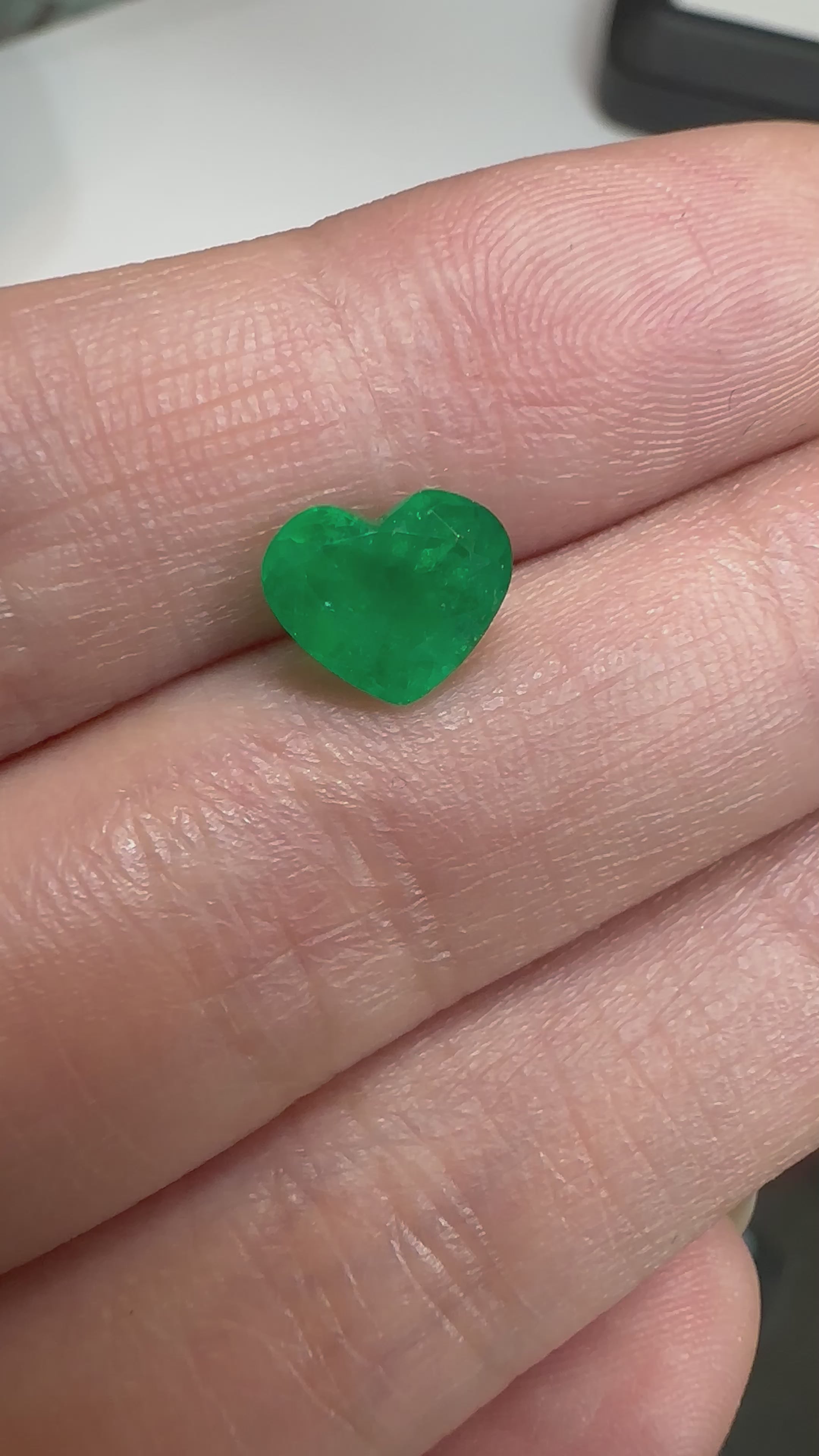 Dark green Colombian emerald in heart shape, 1.54 ct, with beautiful internal depth and balance