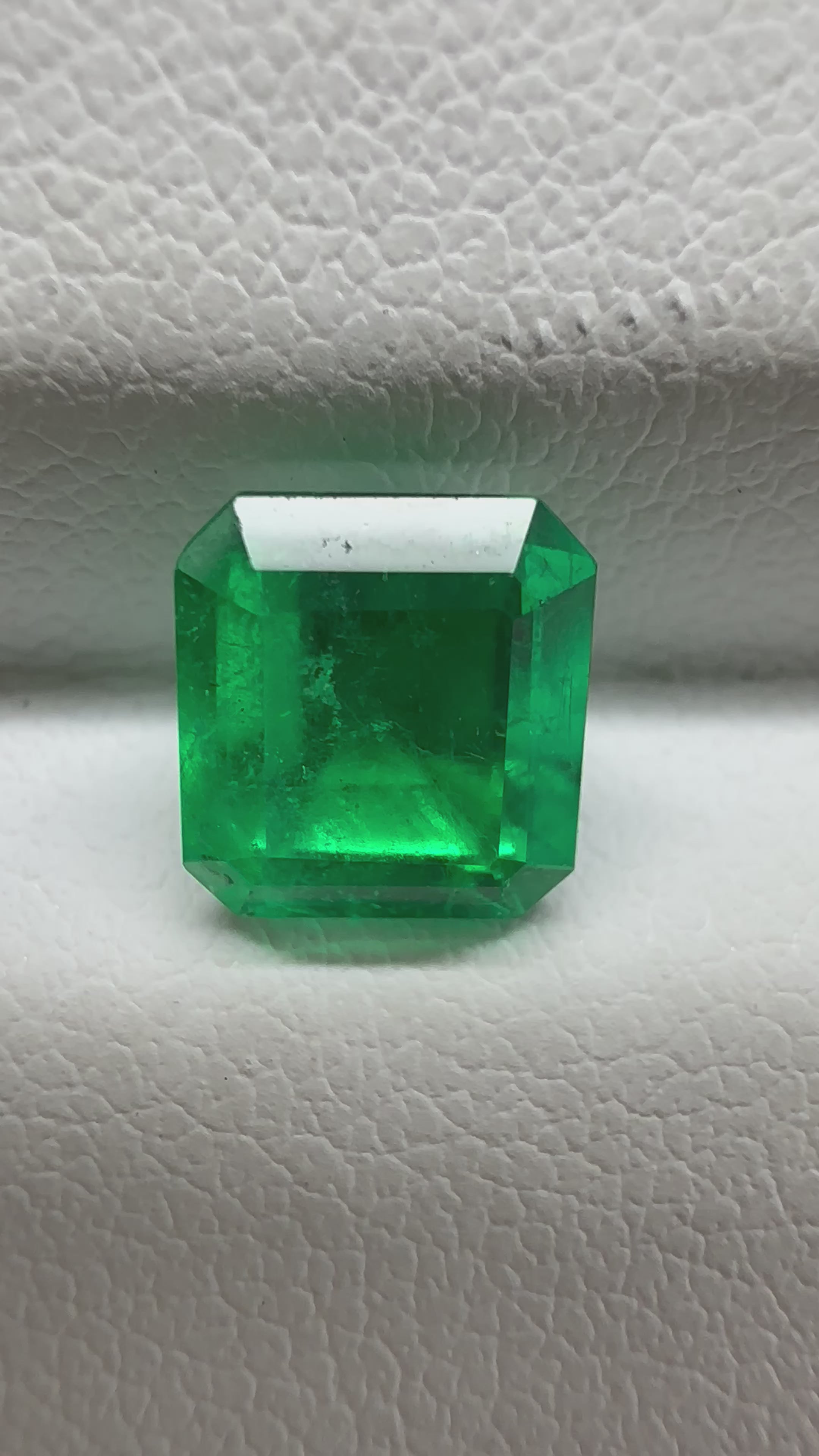 1.52 ct Colombian emerald, square-shaped, showcasing rare green intensity and charm