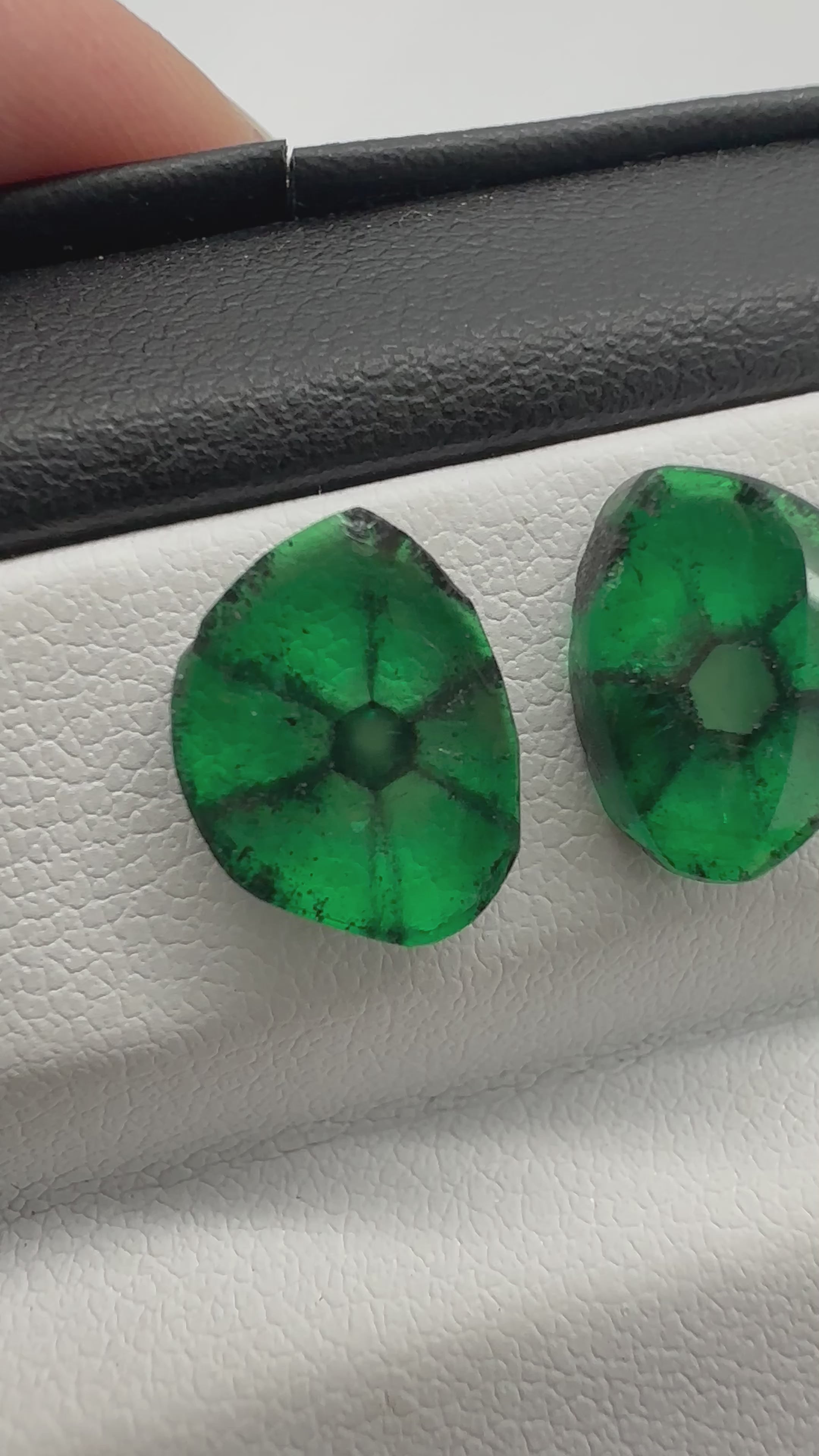 Colombian emeralds with natural trapiche effect, forming a visually stunning set of two