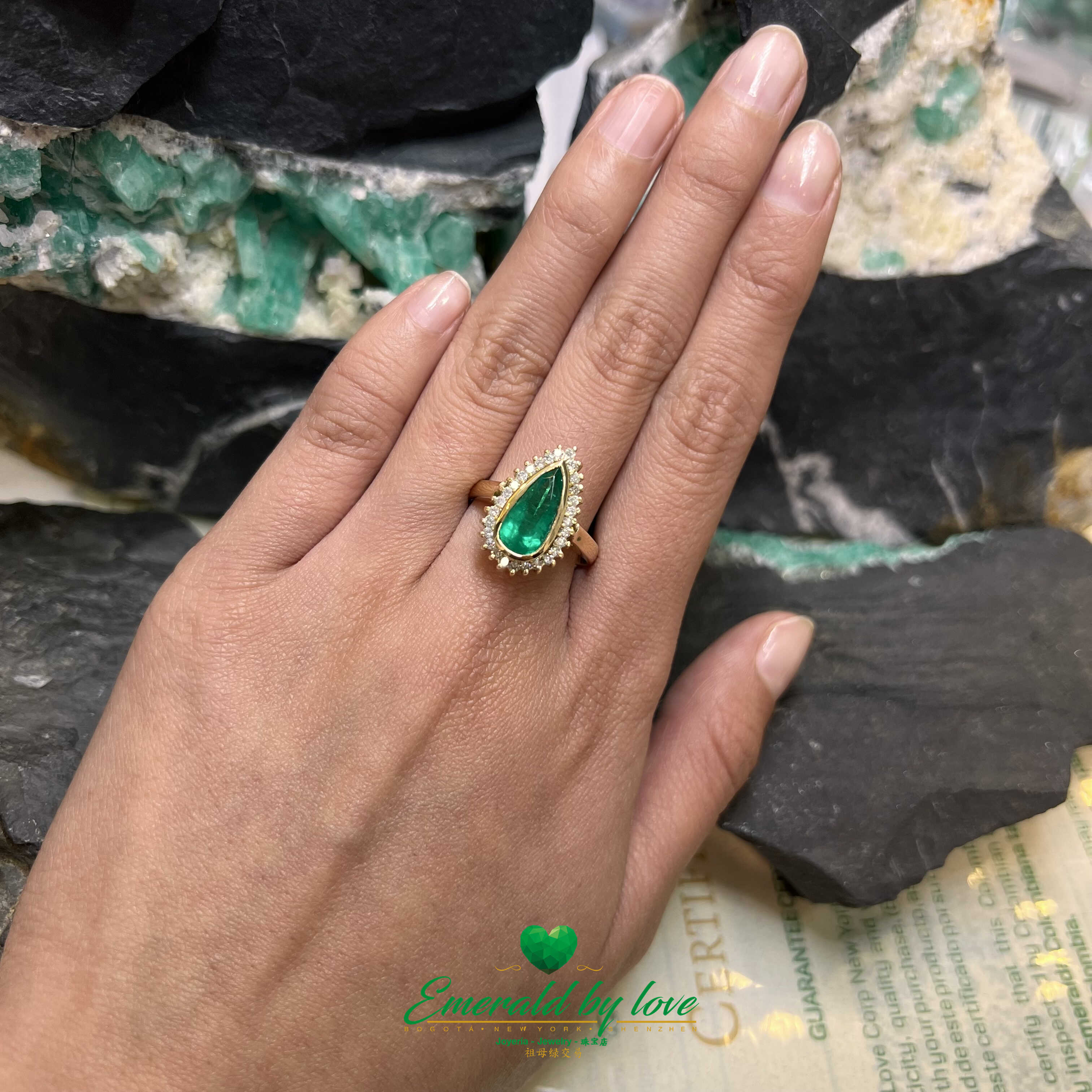 Spectacular Marquise Design: Teardrop Emerald Surrounded by Diamonds in Yellow Gold