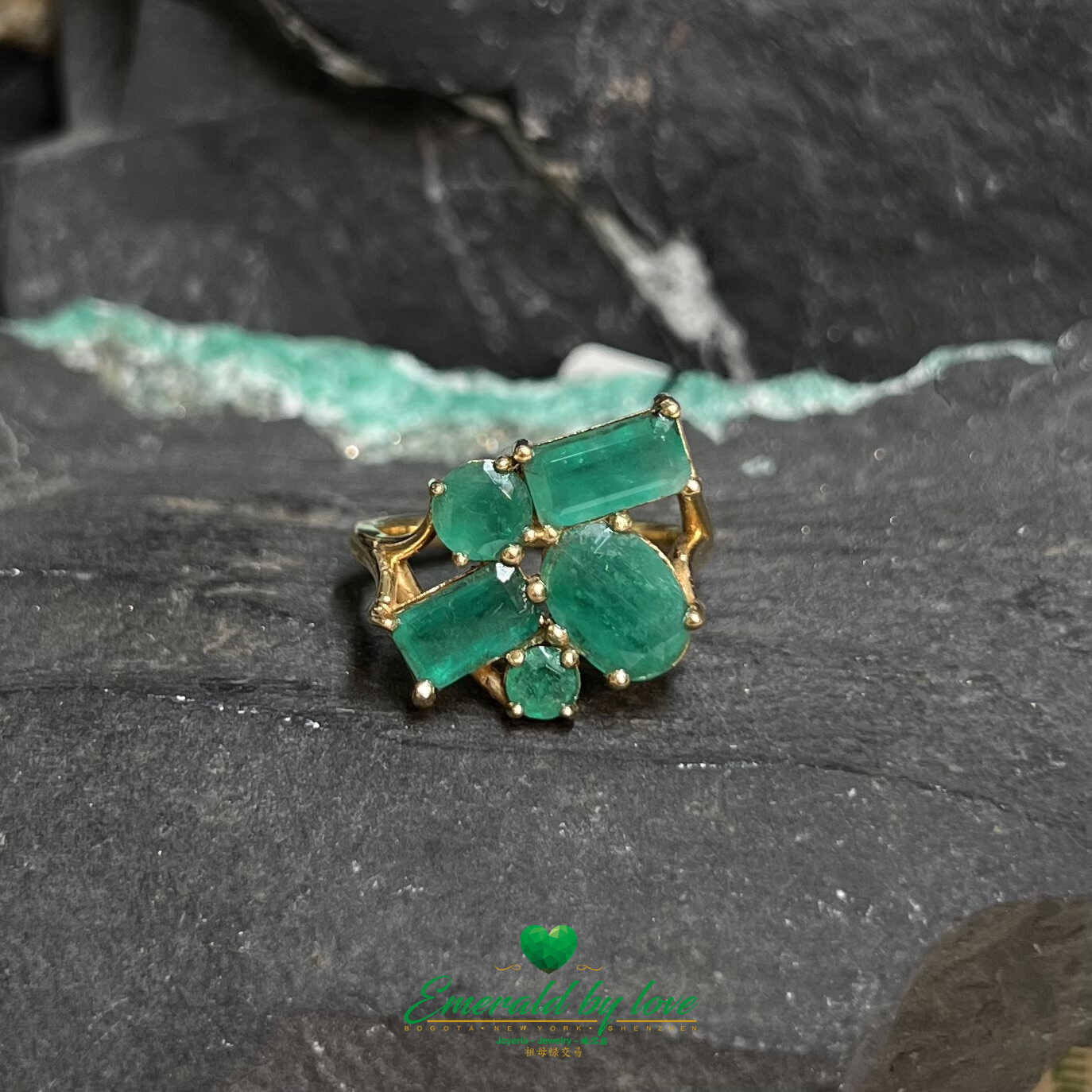 Vibrant Yellow Gold Crazy Ring: Assorted Emeralds for a Playful Statement