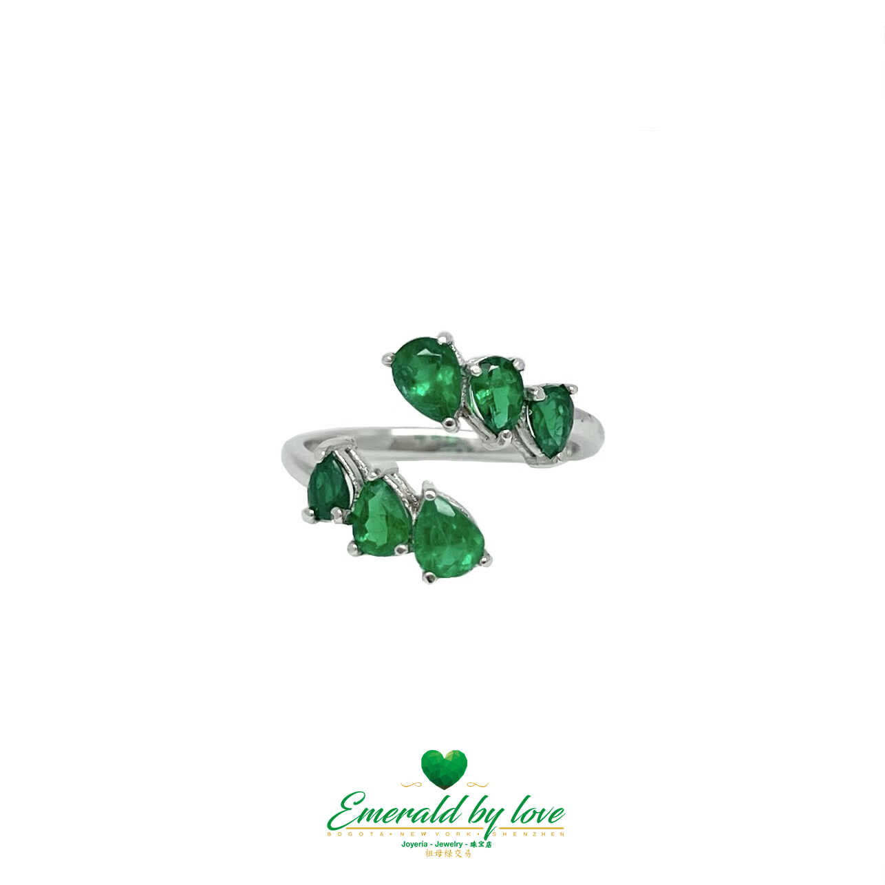 Sleek White Gold Ring: 1.31 TCW Teardrop Emeralds for a Stylish Modern Look