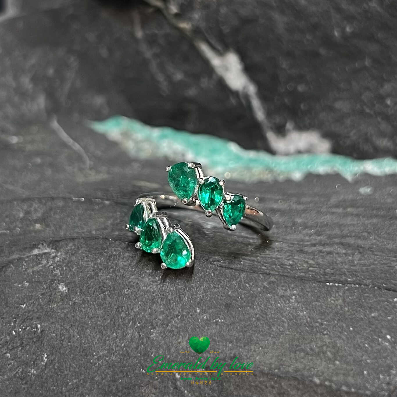 Sleek White Gold Ring: 1.31 TCW Teardrop Emeralds for a Stylish Modern Look