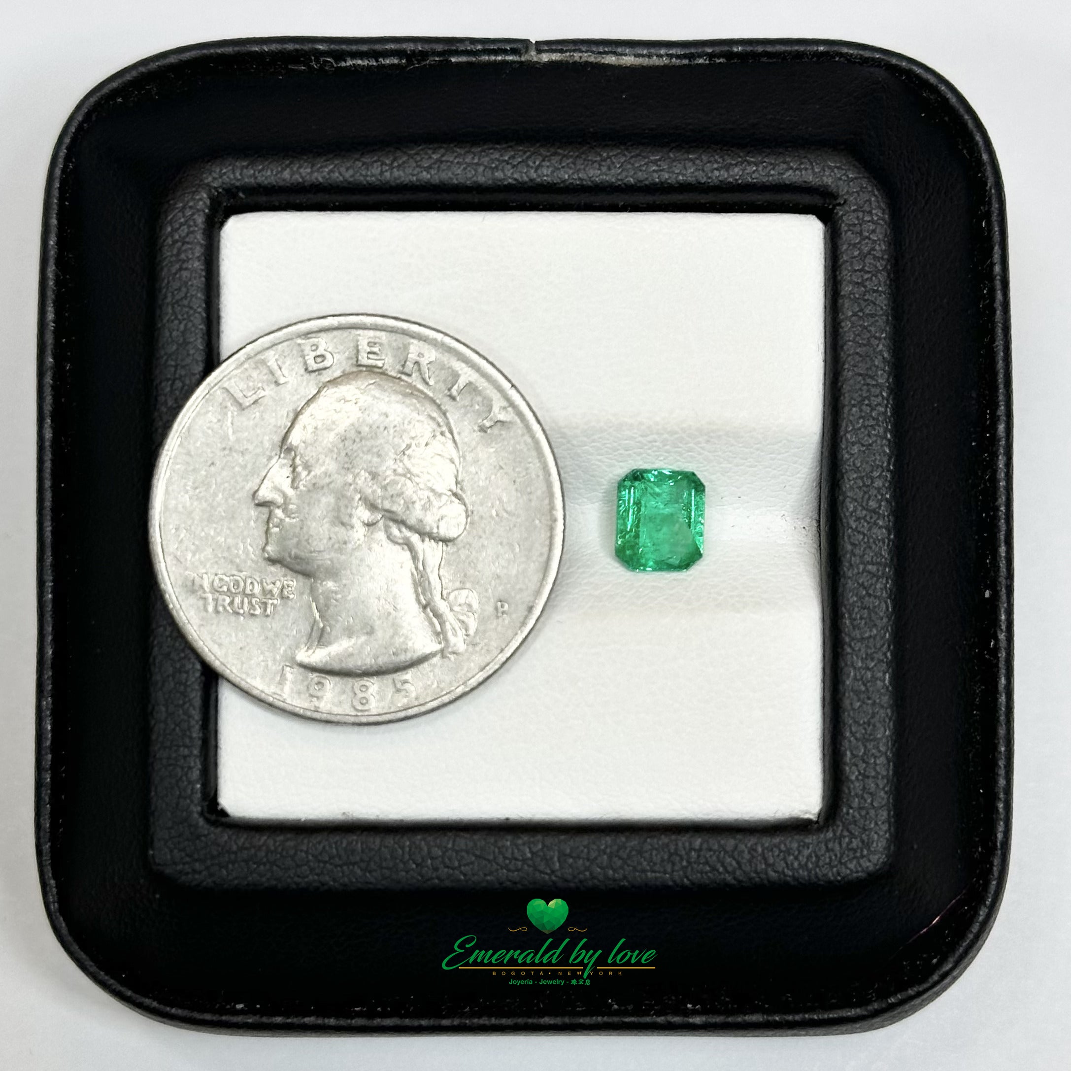 0.67 ct Emerald Cut with Vivid Green Color and High Clarity