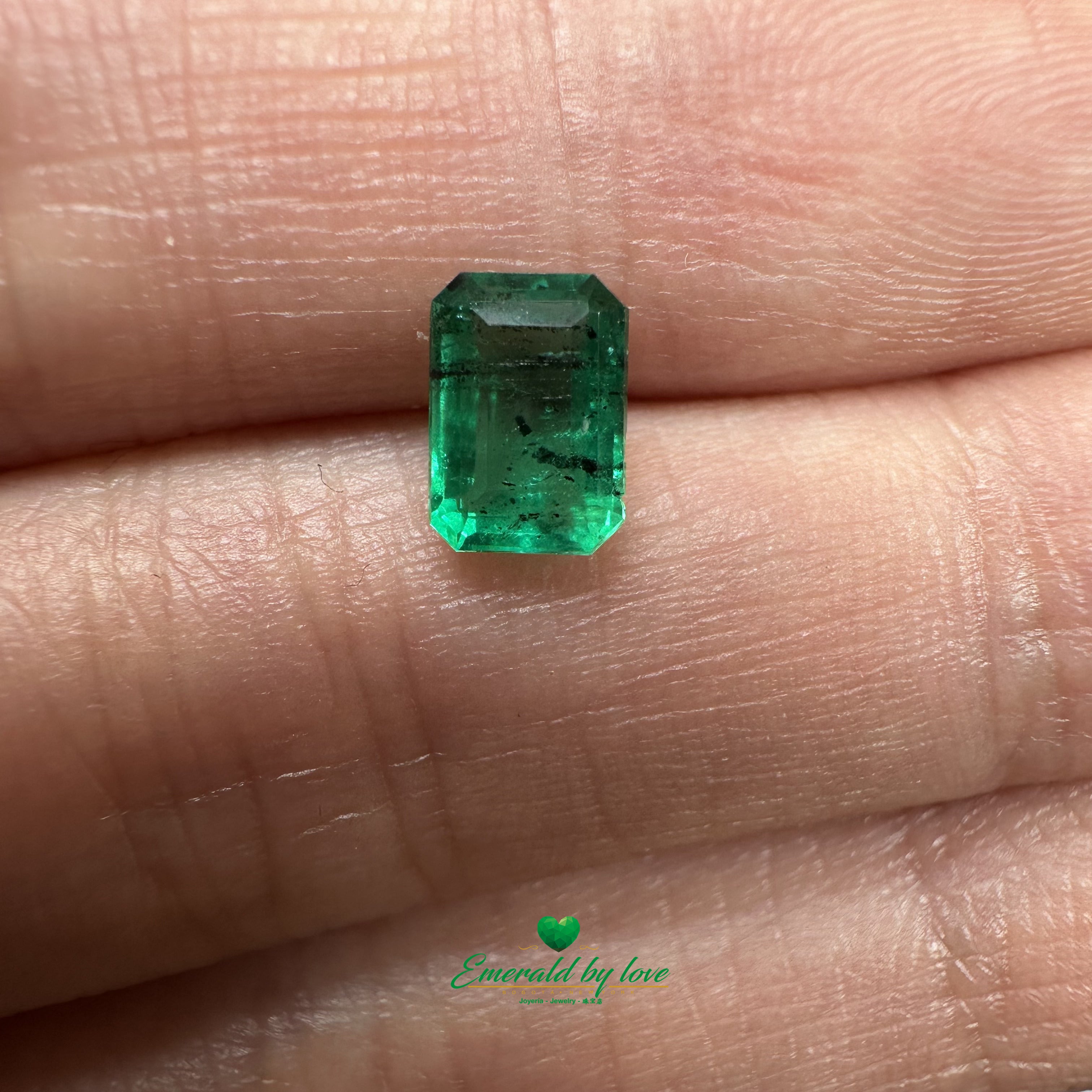 0.77 ct Rectangular Emerald with Subtle Inclusions and Vibrant Green Color