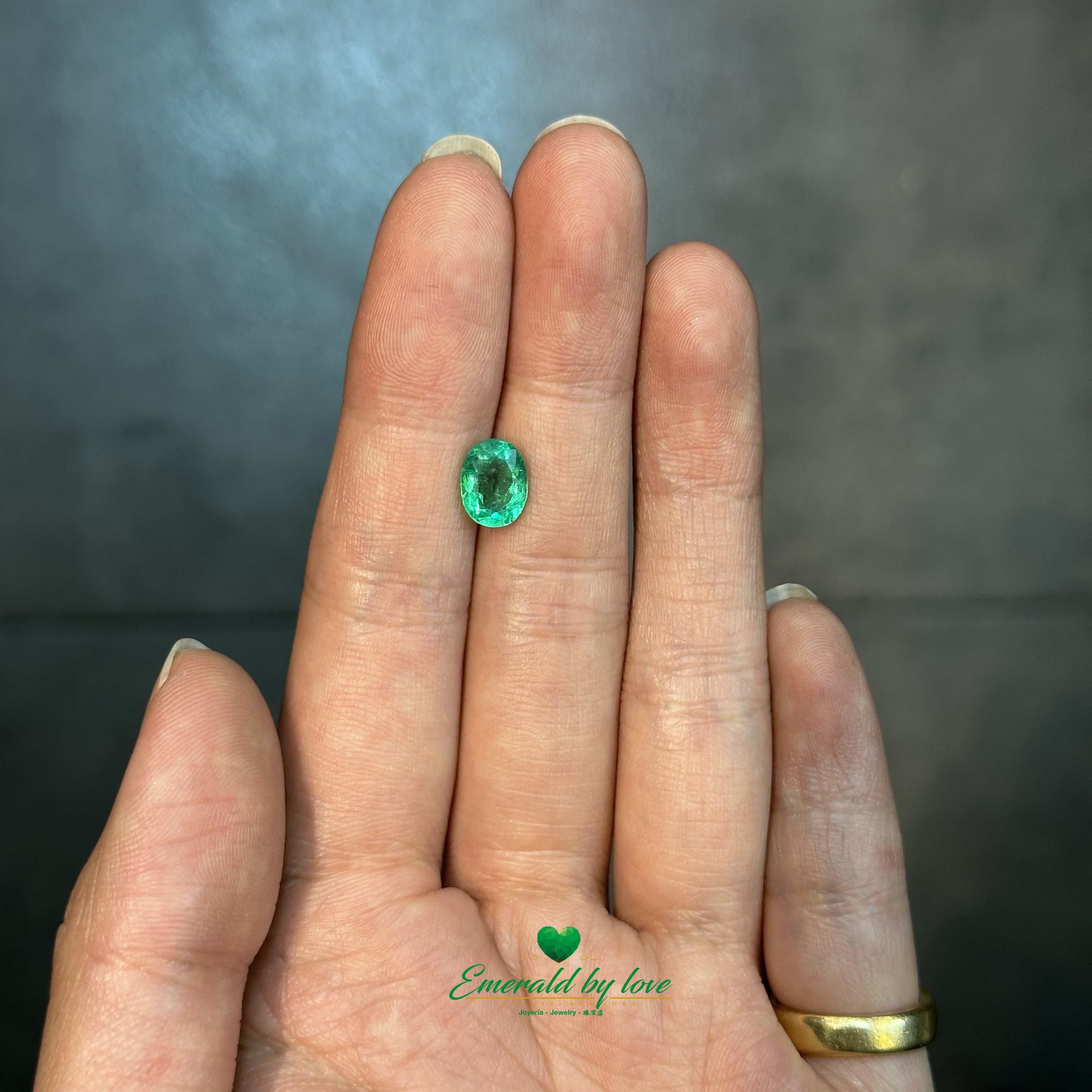  Oval-shaped 1.44 carat Colombian emerald with glowing crystal tone and clean structure