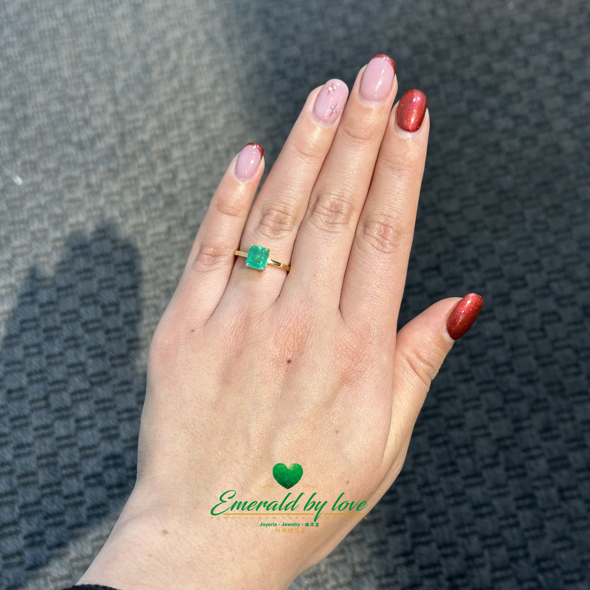 18K Gold Ring Featuring an Emerald-Cut Solitaire