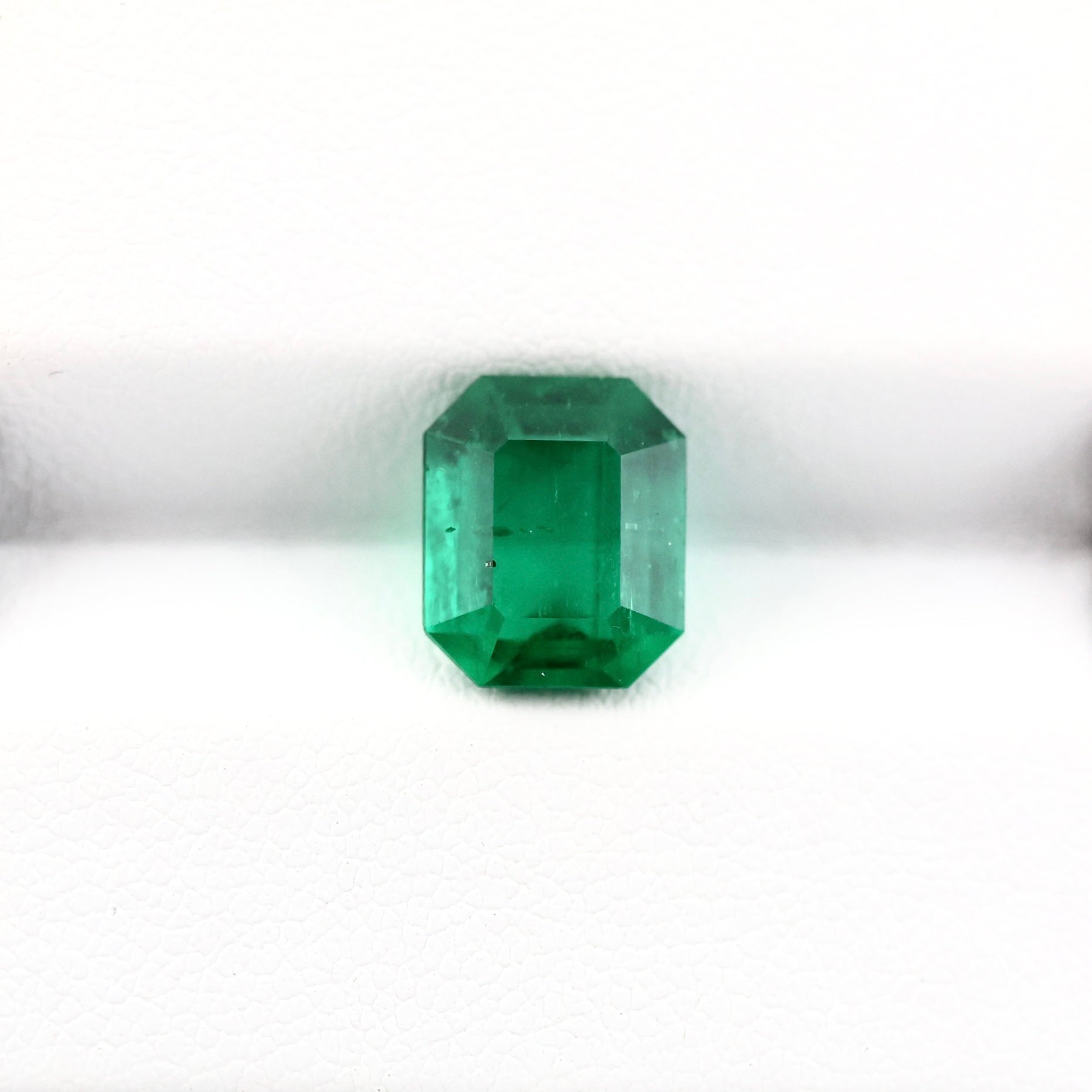 emerald cut intense green colombian emerald 