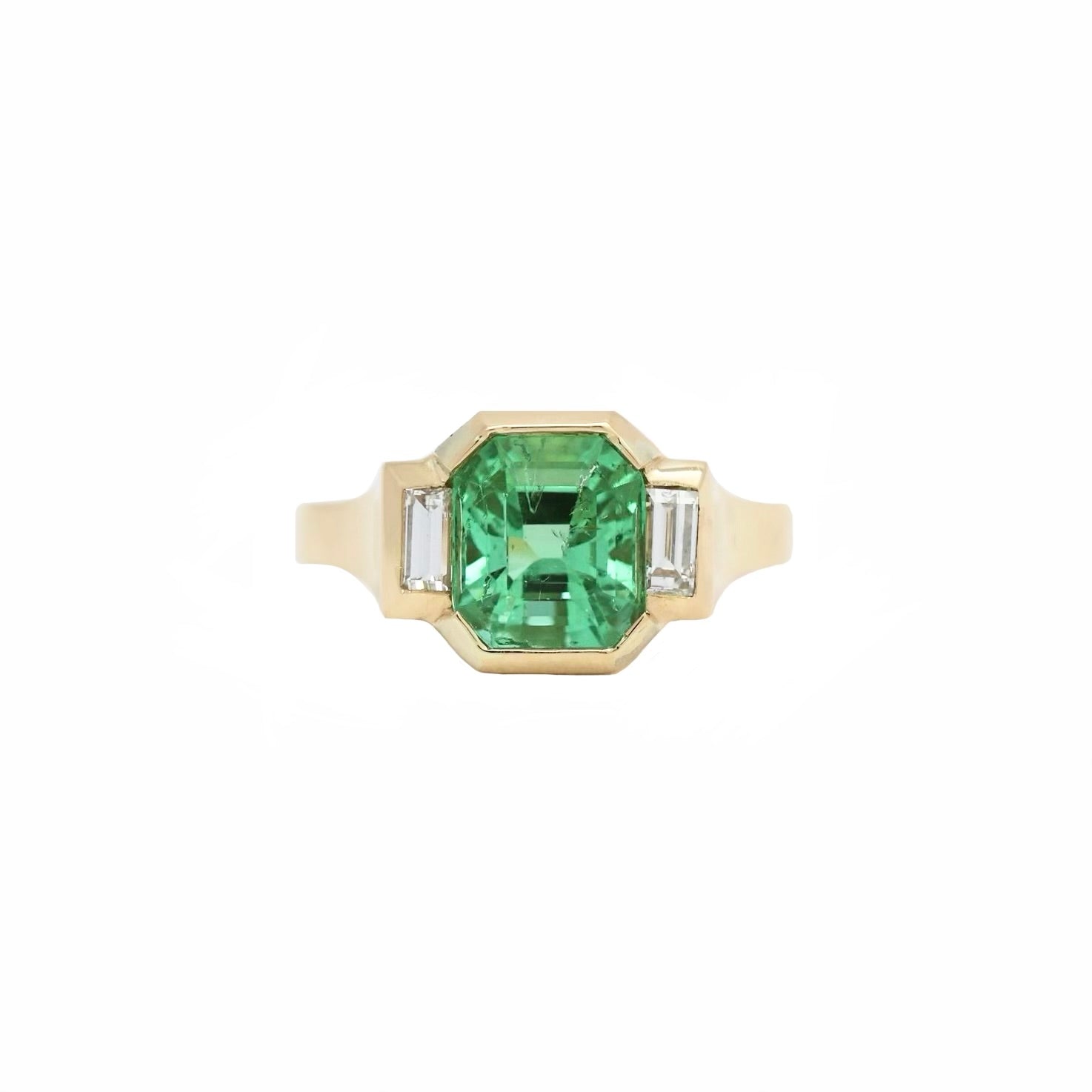 Elegant Colombian Emerald Bezel Ring in Yellow Gold with Diamond Baguette Side Stones