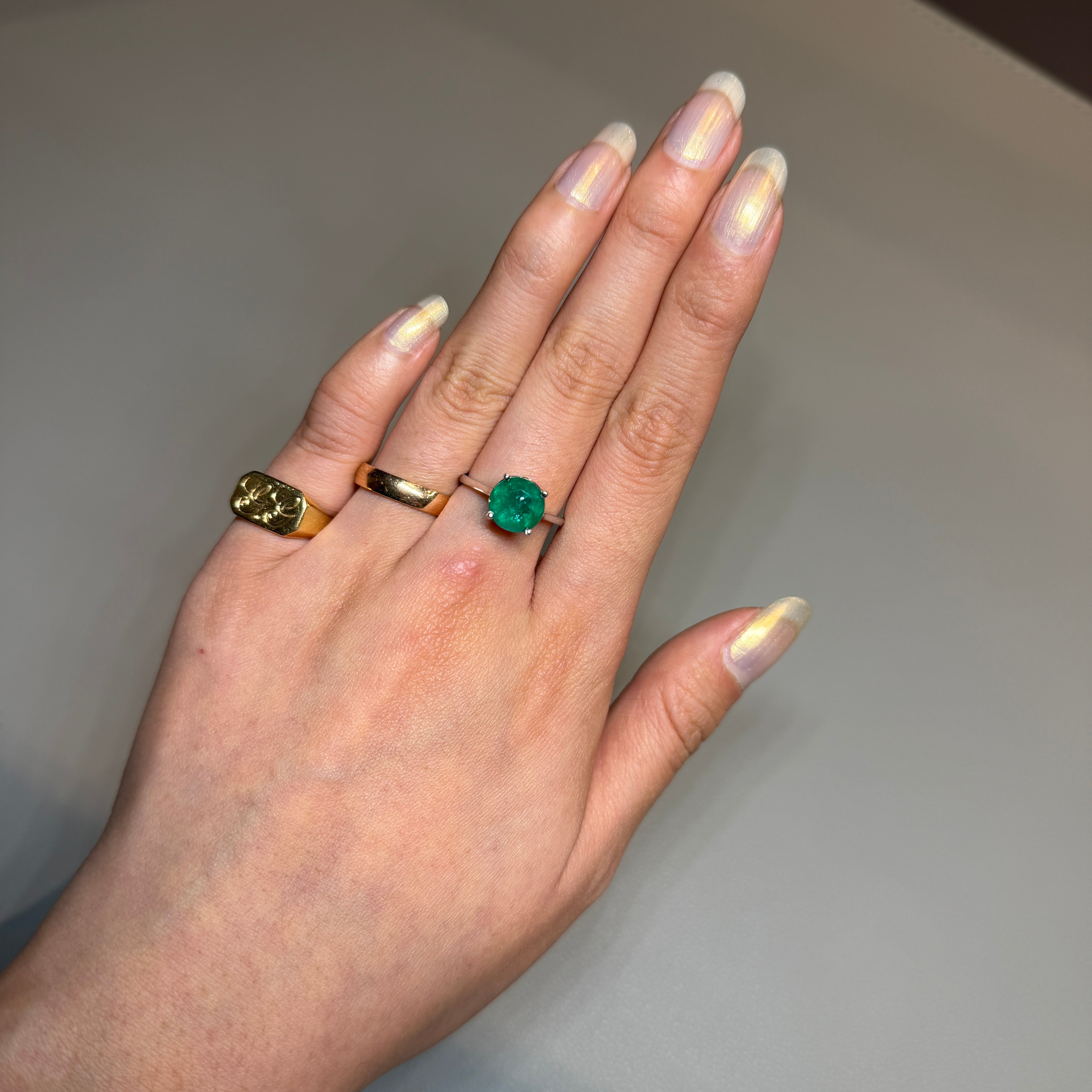 White Gold Colombian Emerald Engagement Ring | Round Emerald Solitaire with Diamond Cone Details