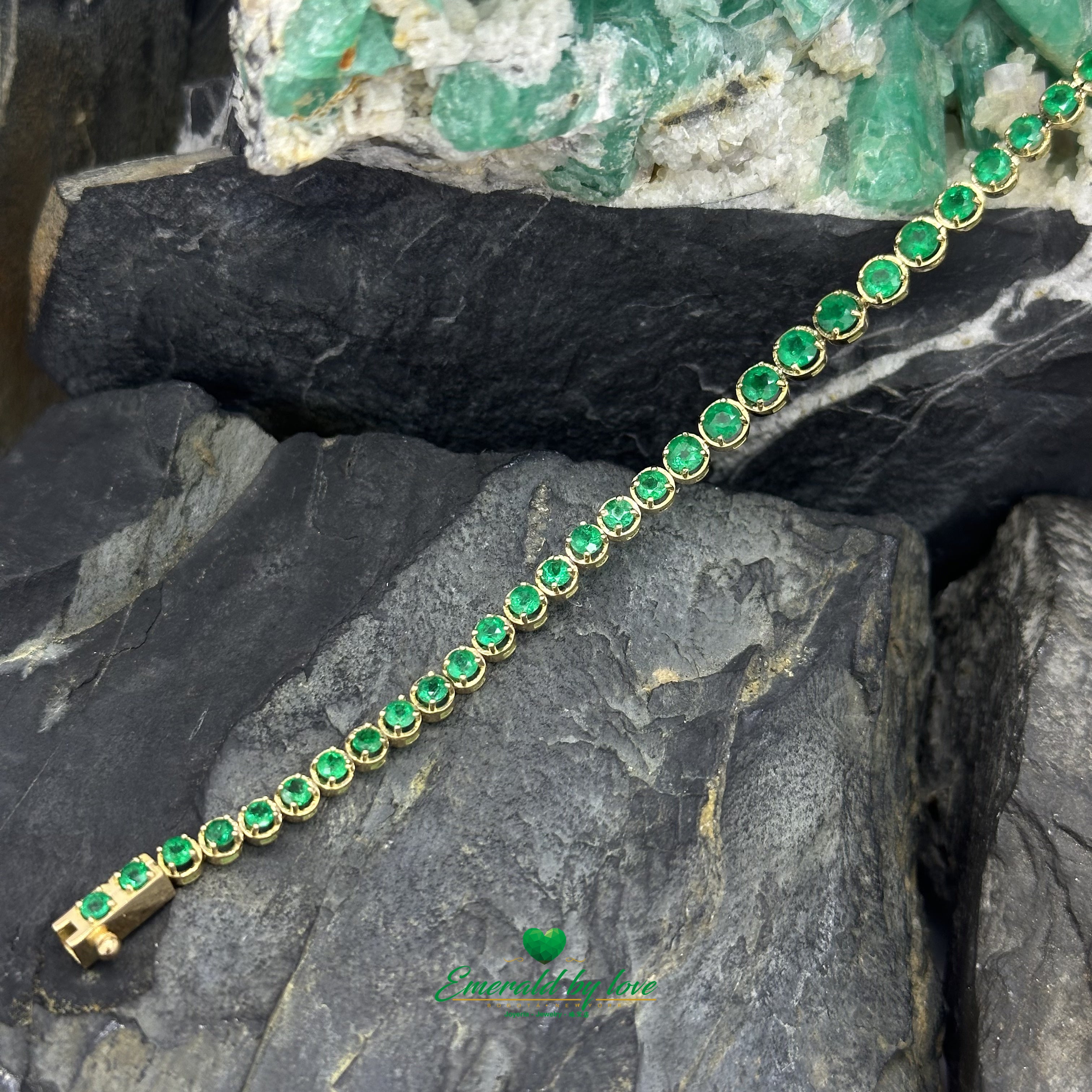 Tennis Bracelet in 18K Yellow Gold with Round Colombian Emeralds in Four-Prong Settings
