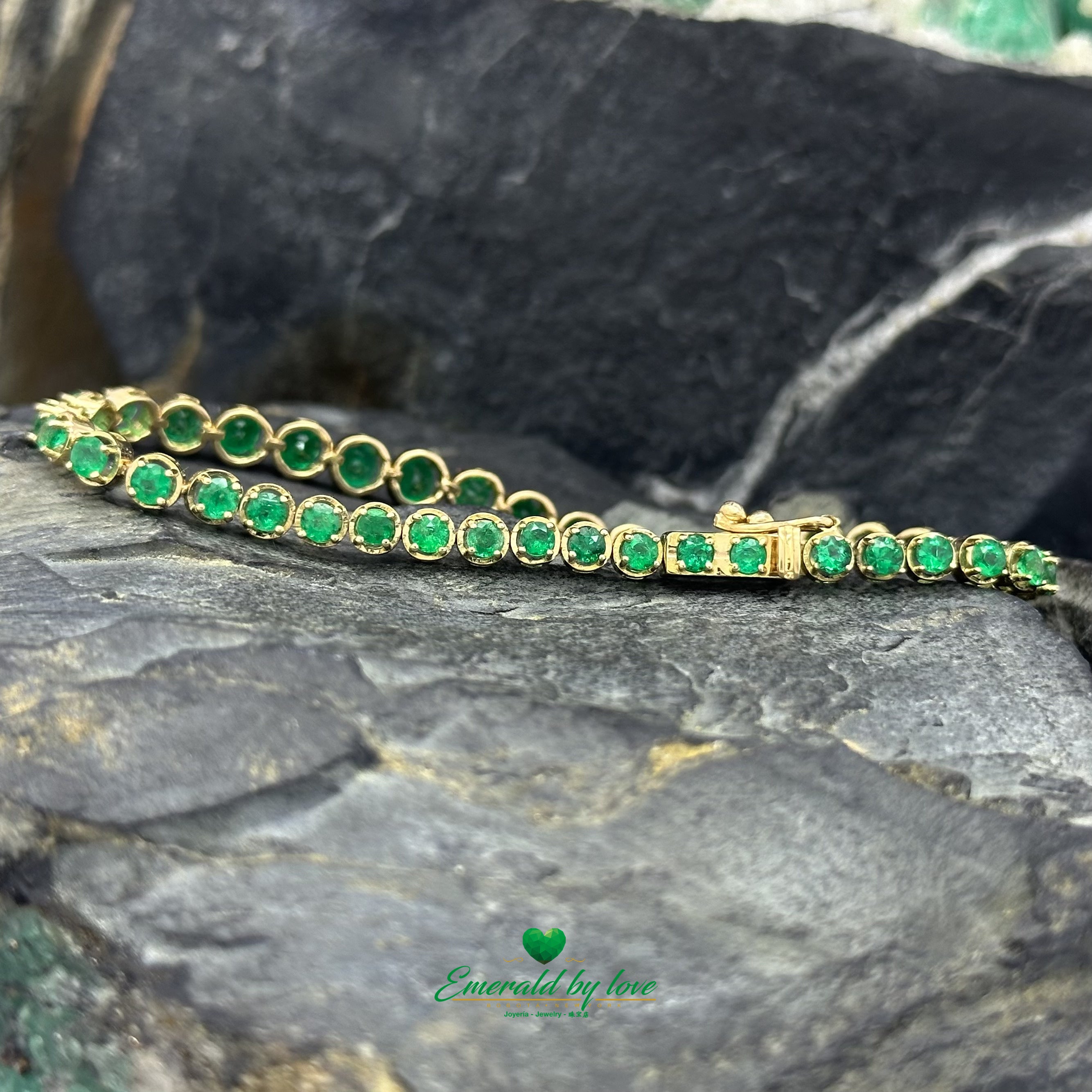 Tennis Bracelet in 18K Yellow Gold with Round Colombian Emeralds in Four-Prong Settings