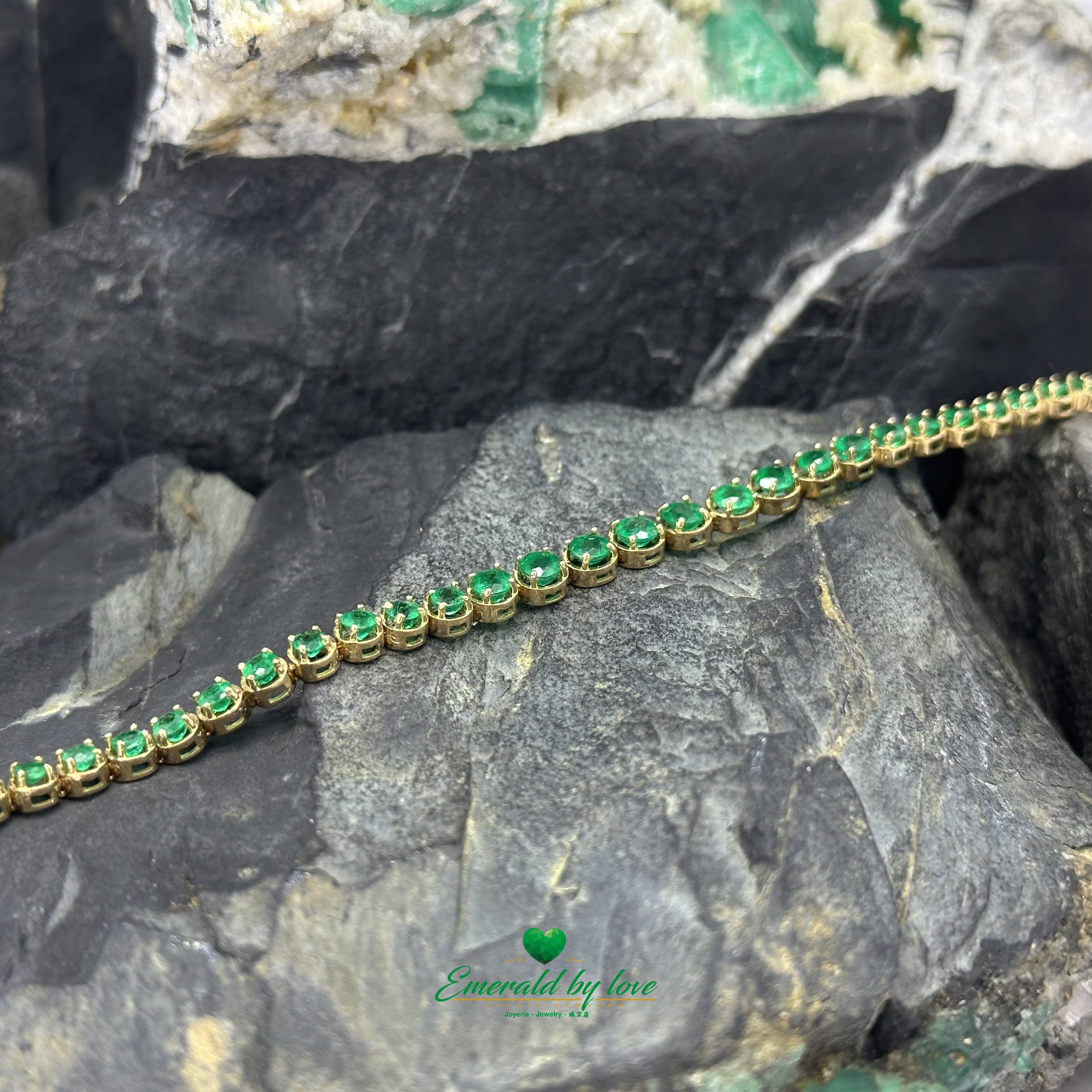 Tennis Bracelet in 18K Yellow Gold with Round Colombian Emeralds in Four-Prong Settings