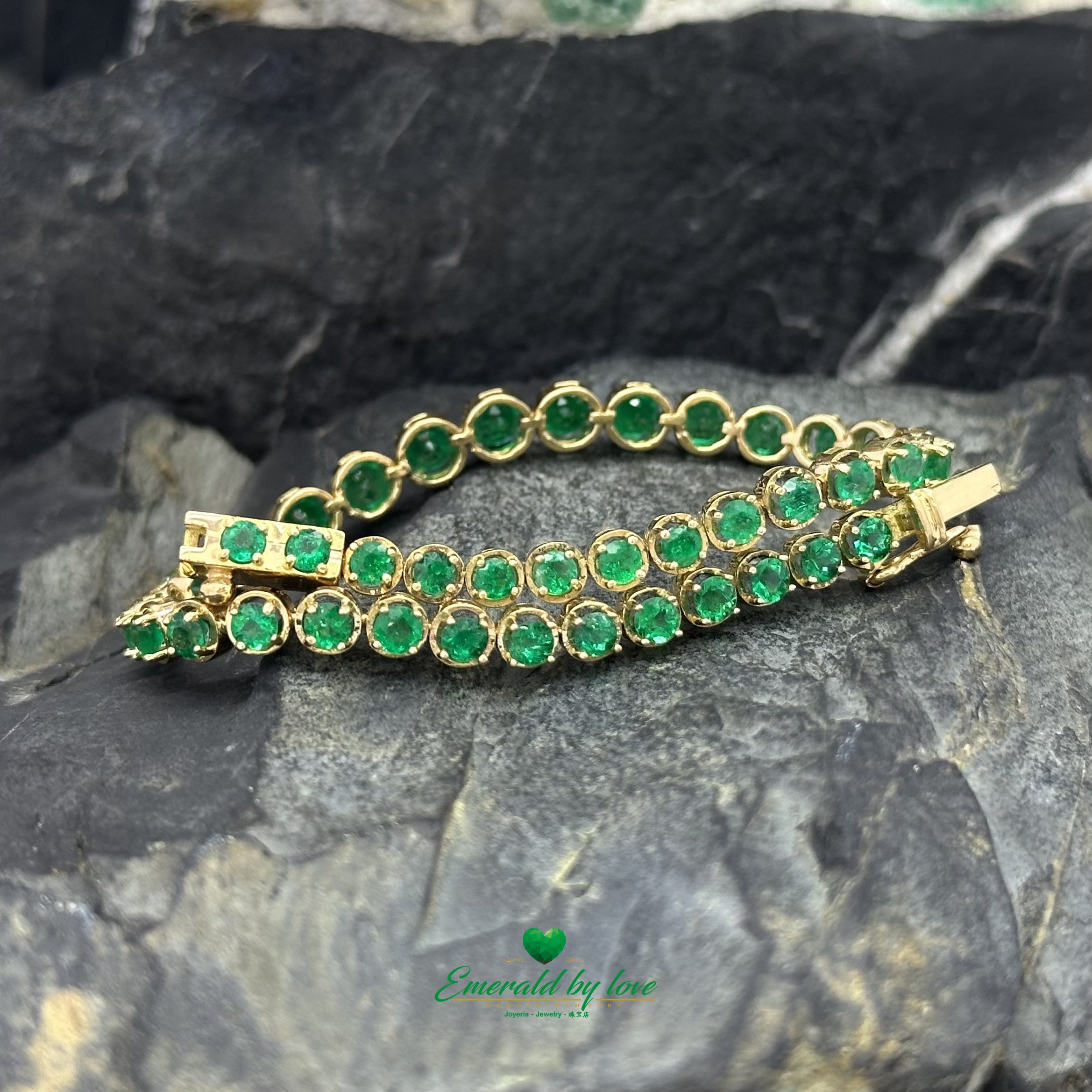 Tennis Bracelet in 18K Yellow Gold with Round Colombian Emeralds in Four-Prong Settings
