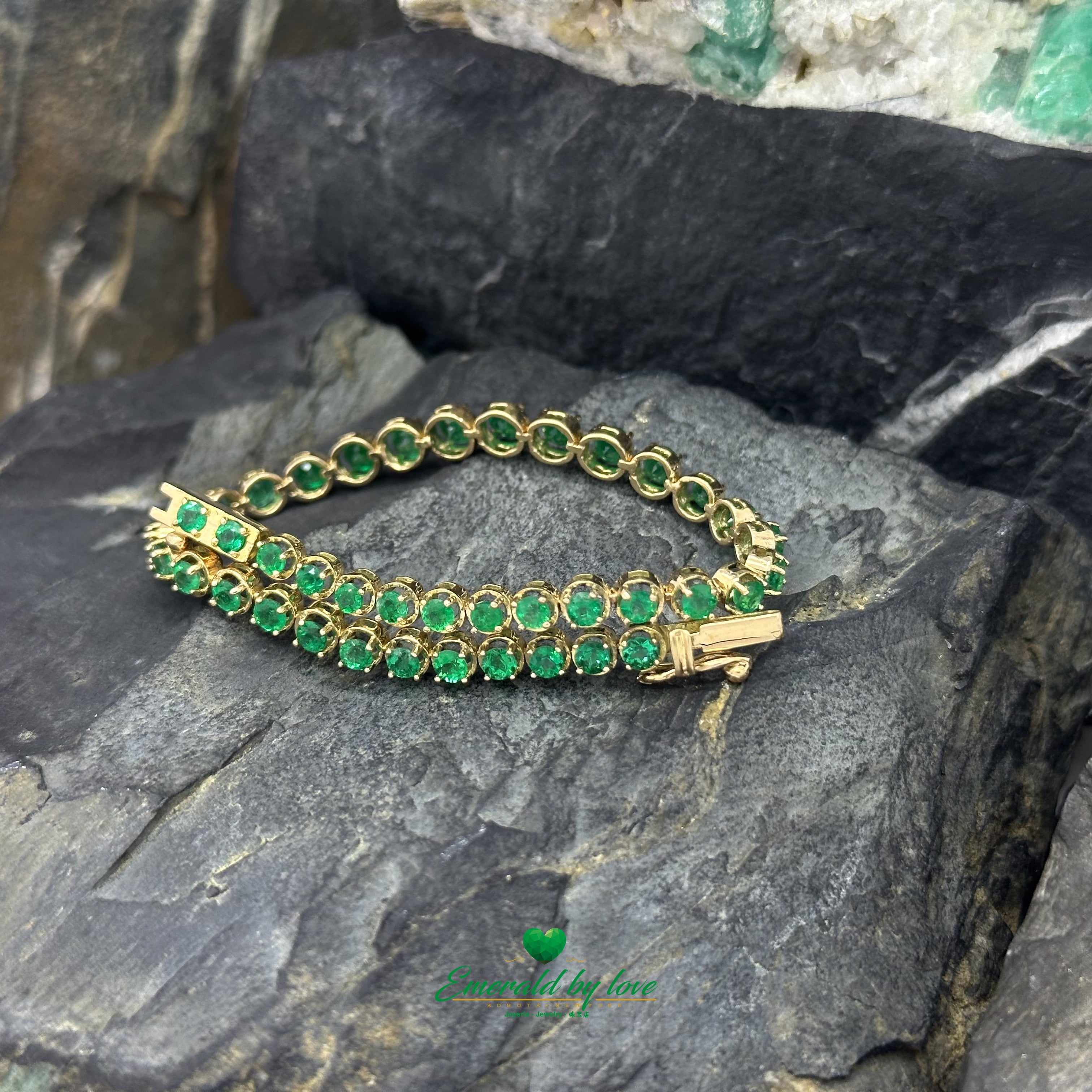 Tennis Bracelet in 18K Yellow Gold with Round Colombian Emeralds in Four-Prong Settings