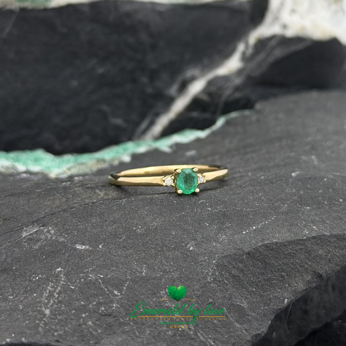 Colombian Emerald Ring with Oval Center and Side Diamonds