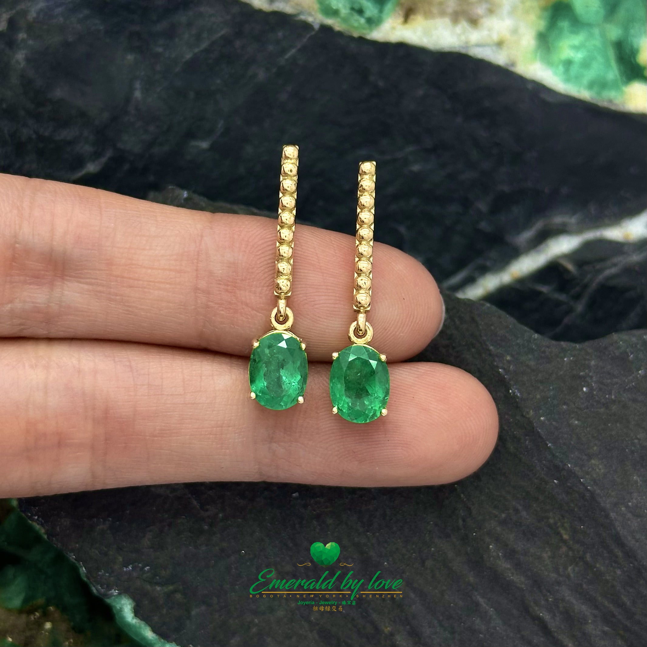 Golden Elegance: Oval Emerald Long Earrings with Round Textured Design