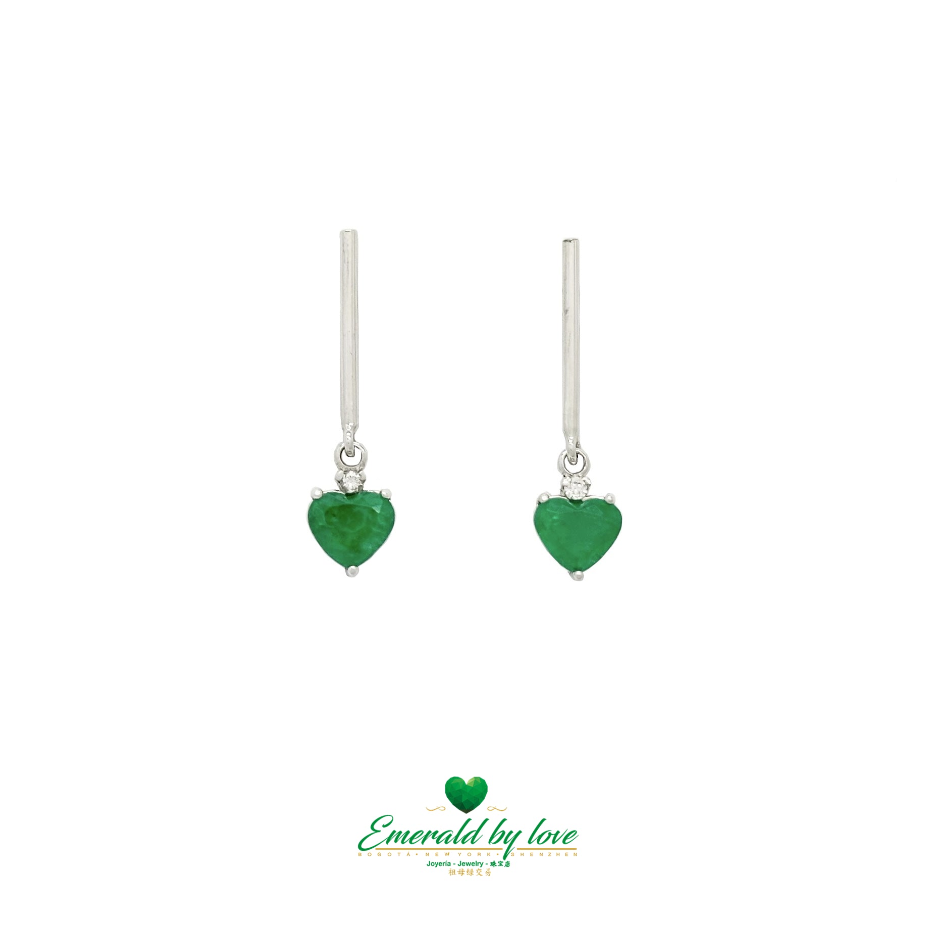 Heartfelt Radiance: Long White Gold Earrings with Heart-Shaped Emeralds