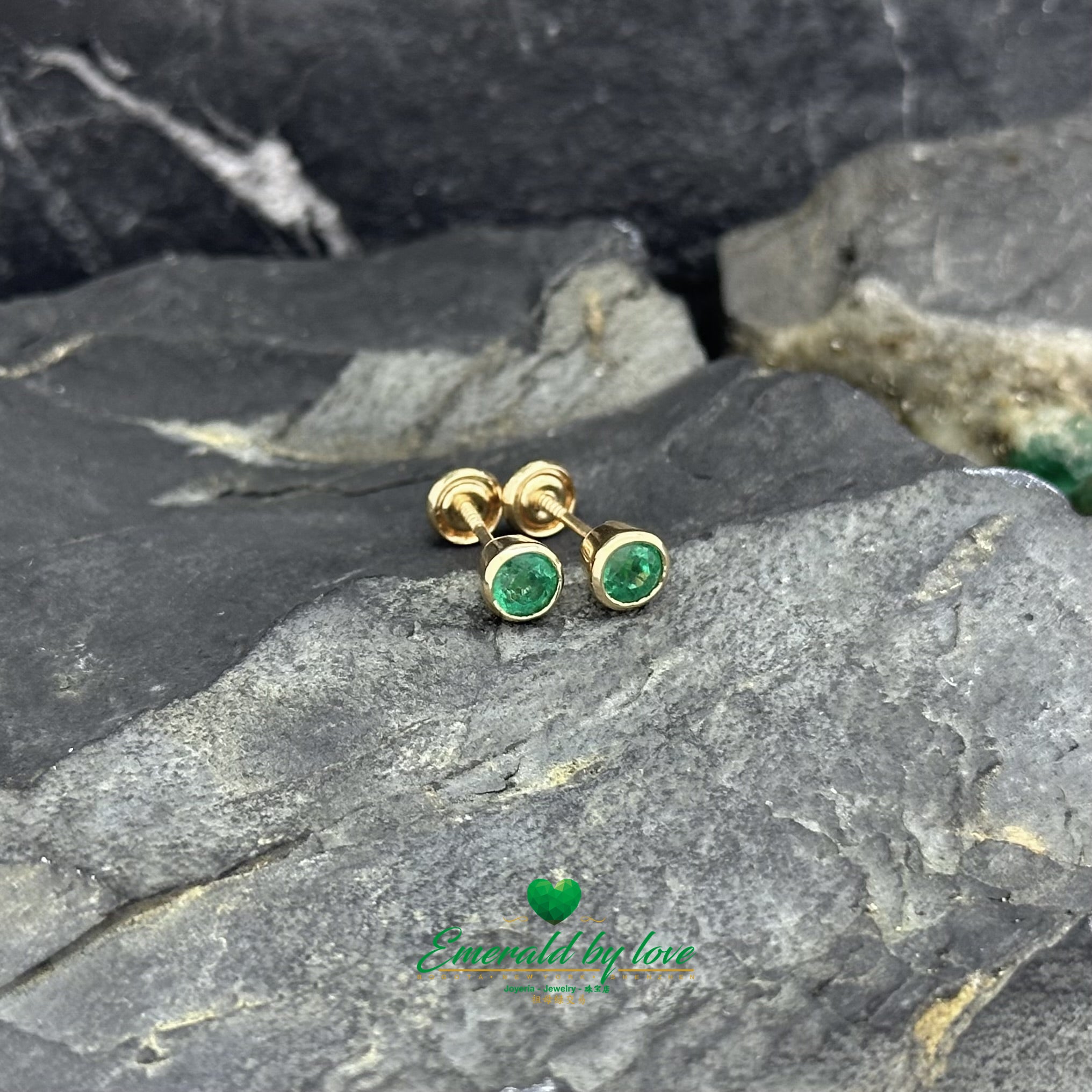 Yellow Gold Round Emerald Studs in Bezel Setting