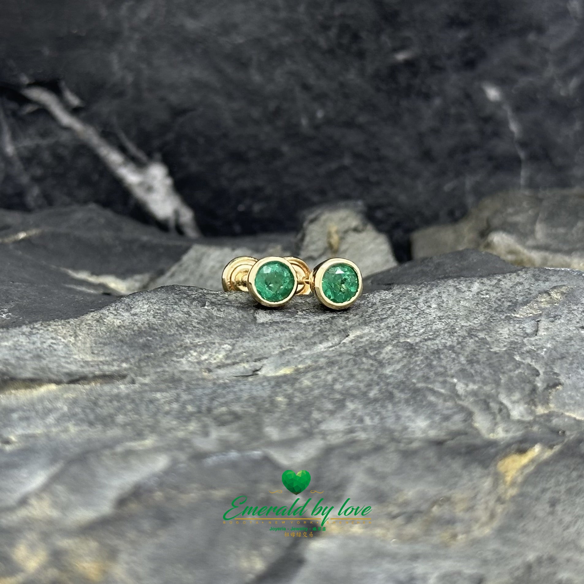 Yellow Gold Round Emerald Studs in Bezel Setting