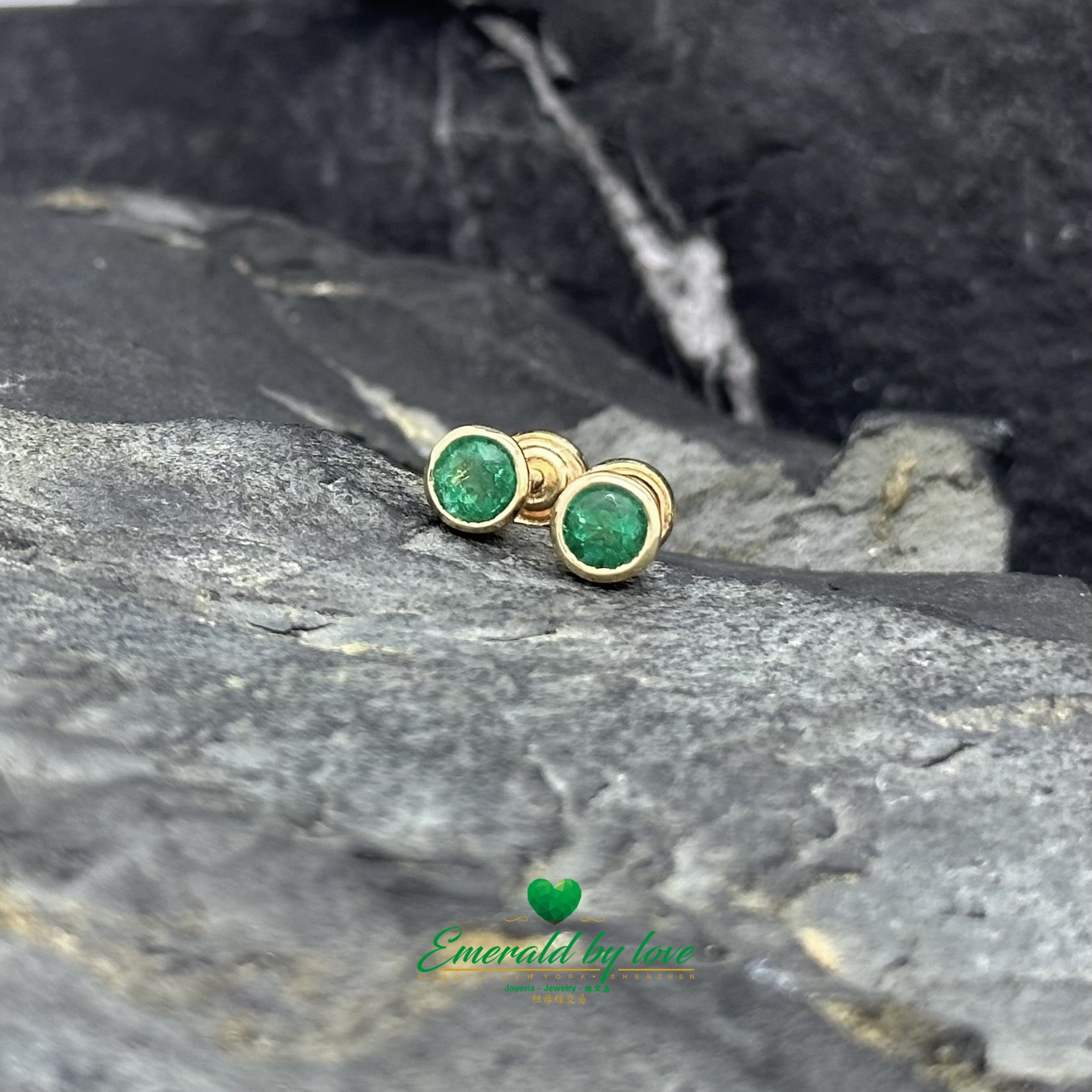 Yellow Gold Round Emerald Studs in Bezel Setting