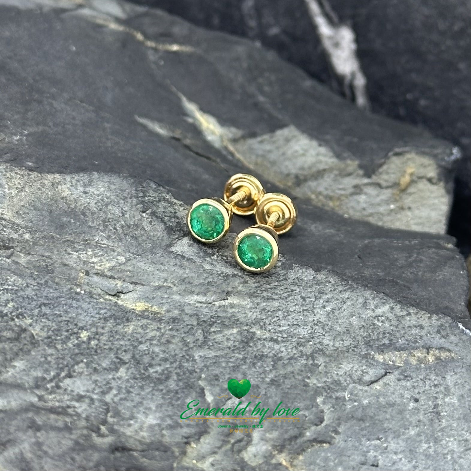 Yellow Gold Round Emerald Studs in Bezel Setting