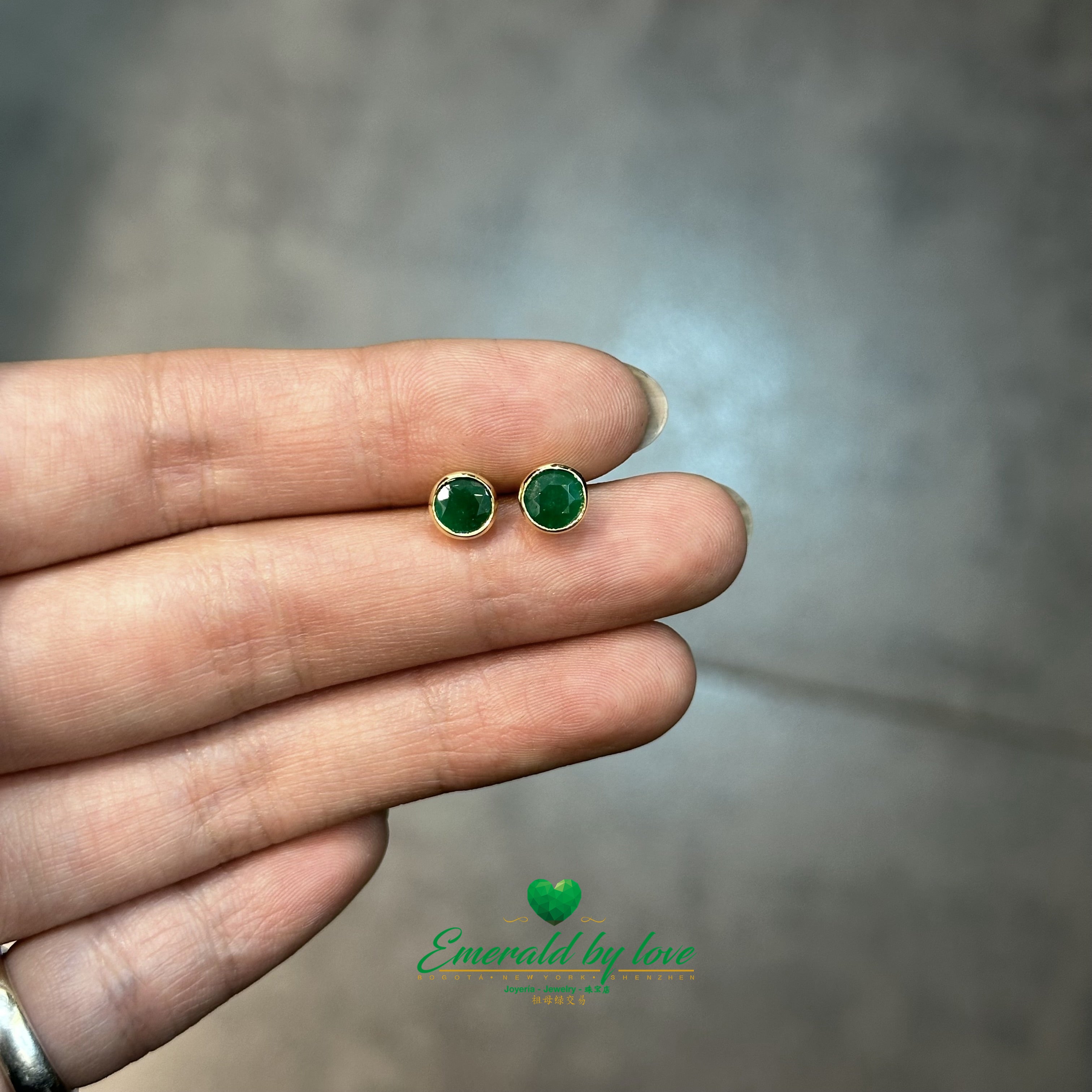 Yellow Gold Studs with 1.1 CT Rounds Emeralds in Bezel Setting