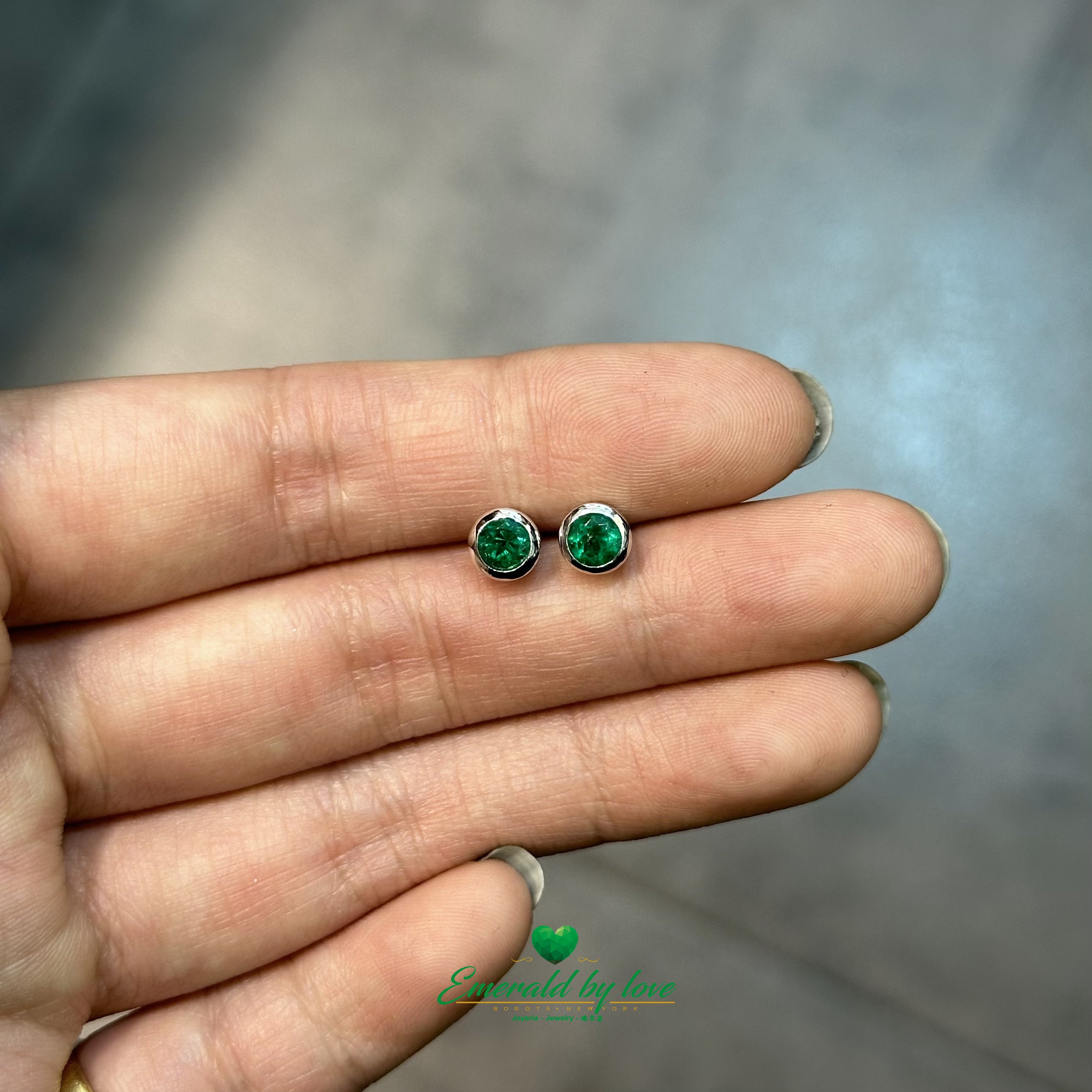 Elegant White Gold Earrings with Round High-Quality Emeralds in Bezel Setting