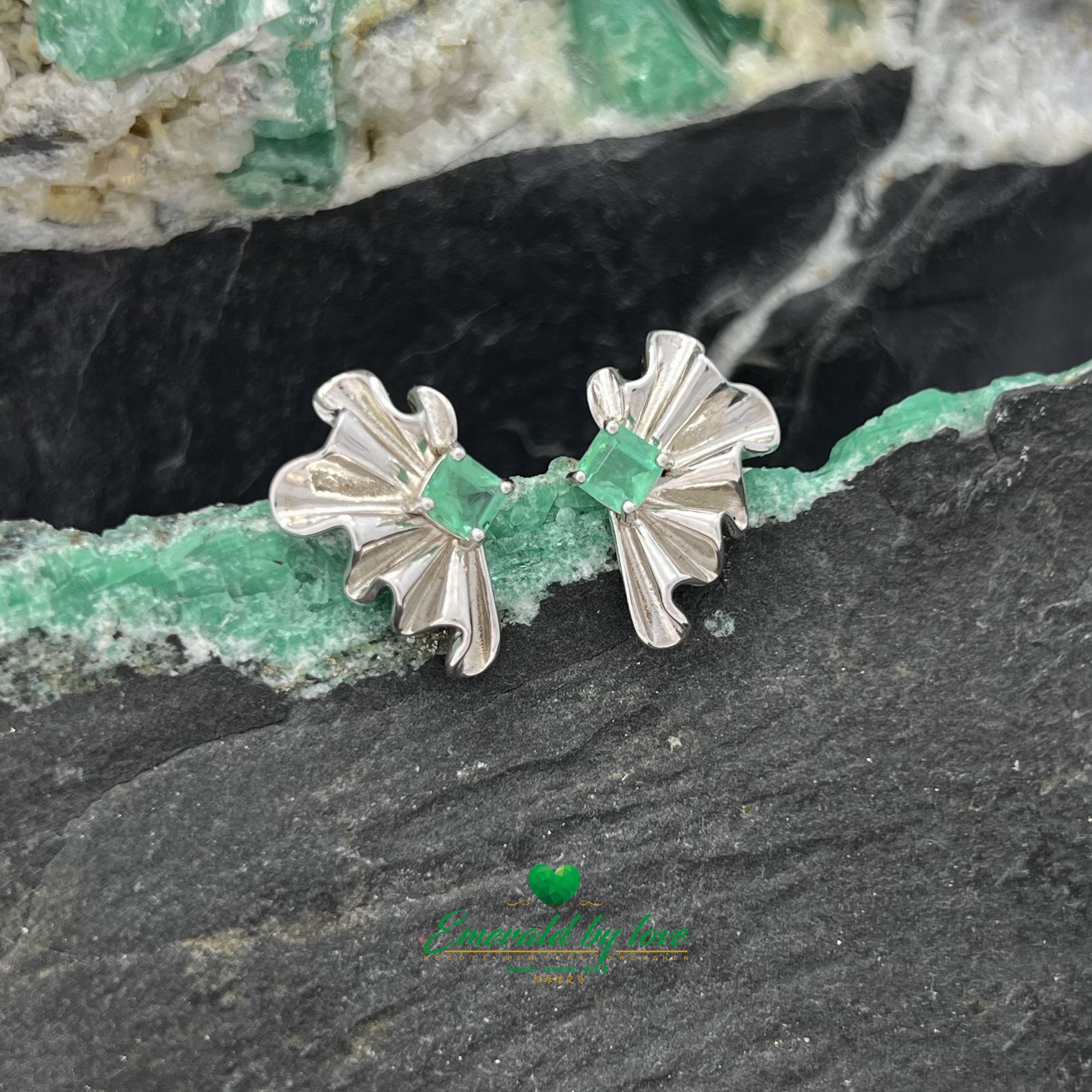 Avant-Garde Earrings with Square Emeralds and Silver Wings