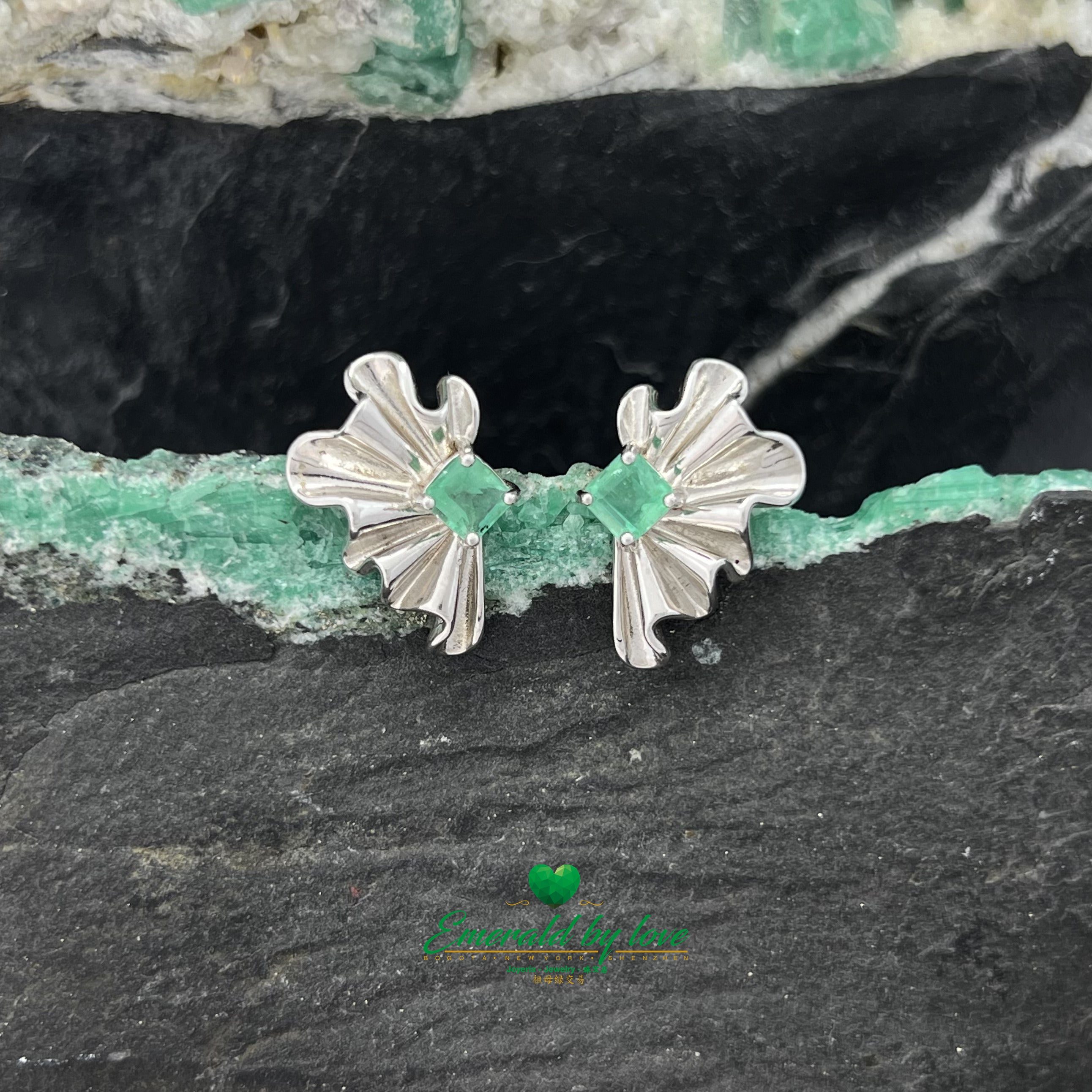 Avant-Garde Earrings with Square Emeralds and Silver Wings