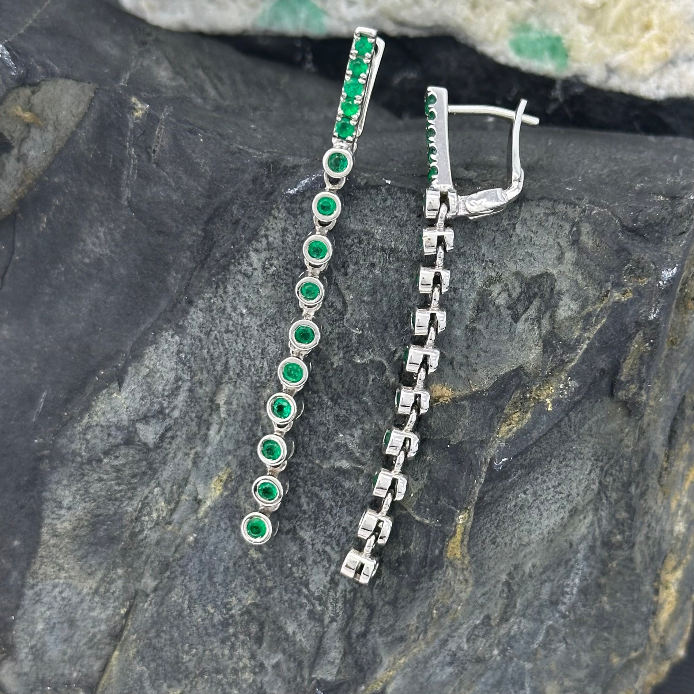 Elongated White Gold Earrings with Round Emeralds in Bezel Setting