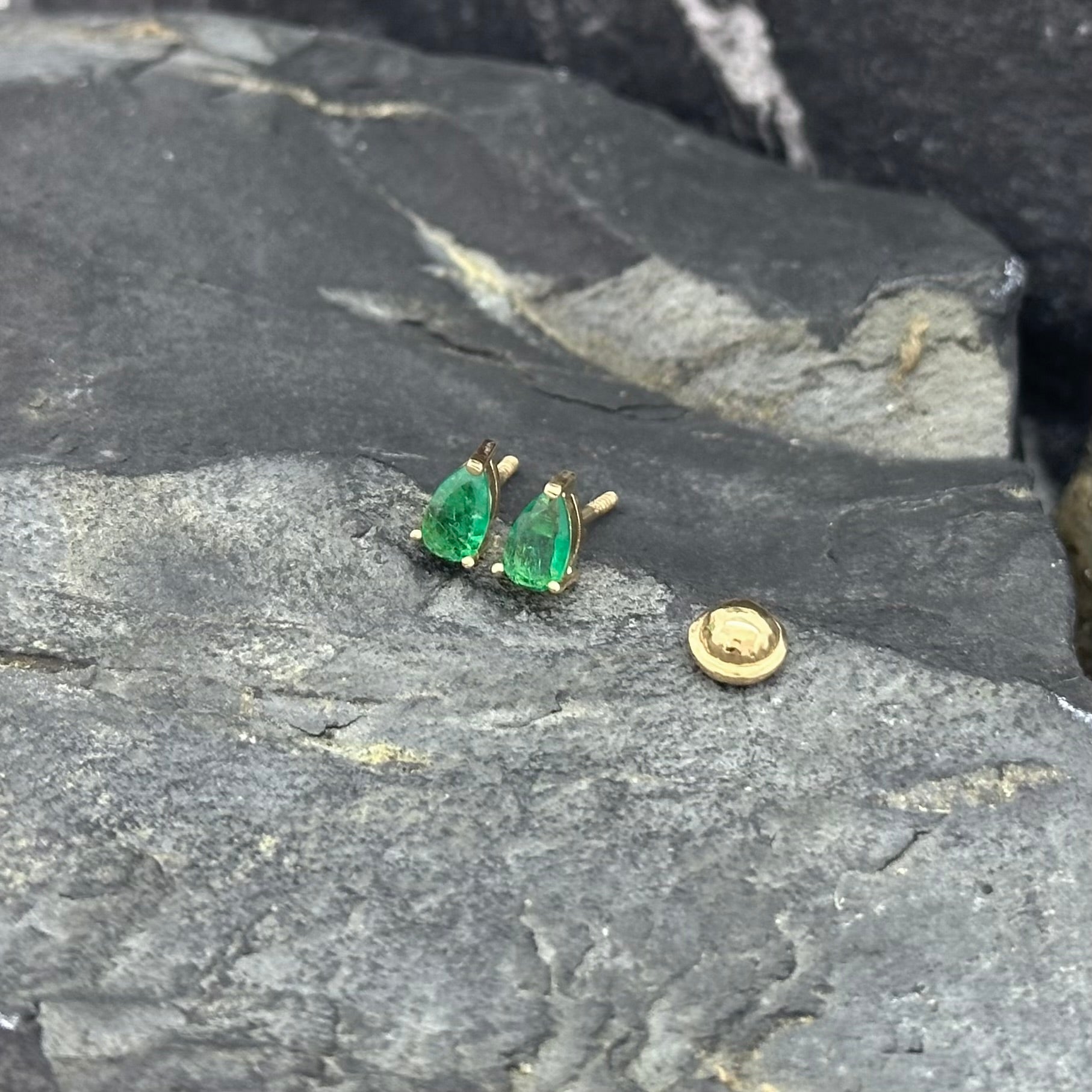 Yellow Gold Round Emerald Studs in Bezel Setting