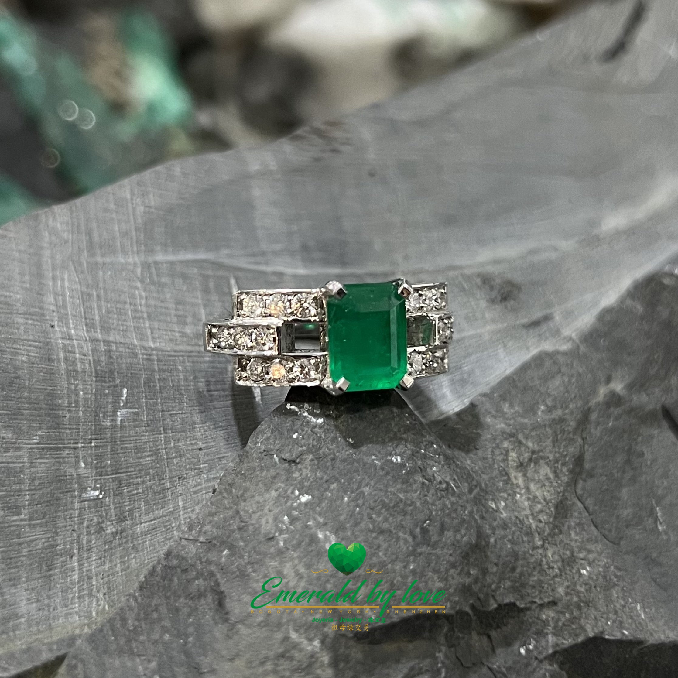 Understated elegance in a clean 18k gold design with a single Colombian emerald.