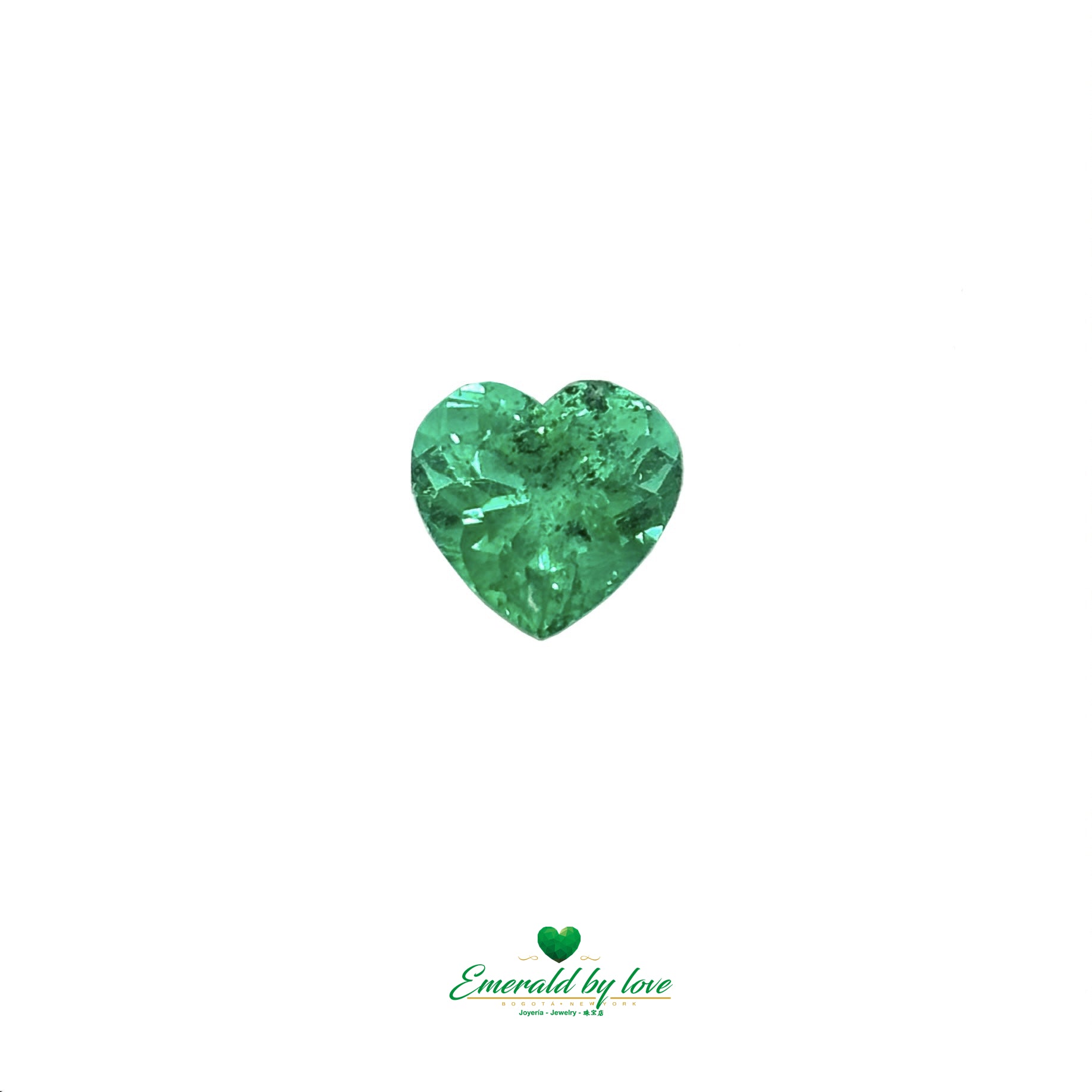 2.8 ct heart-cut Colombian emerald with crystal tone and visible natural carbon inclusions