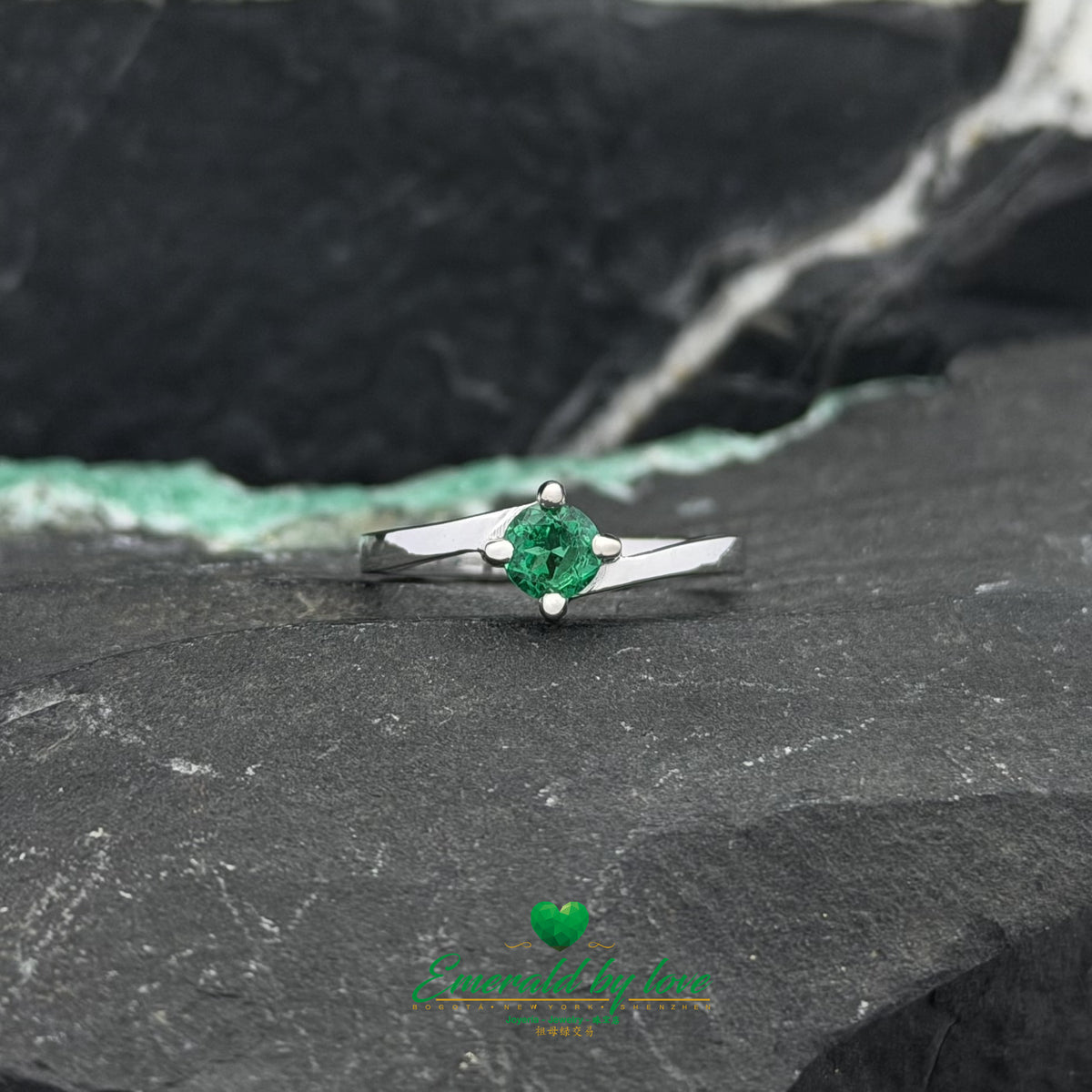 Open White Gold Ring Featuring a Round Emerald