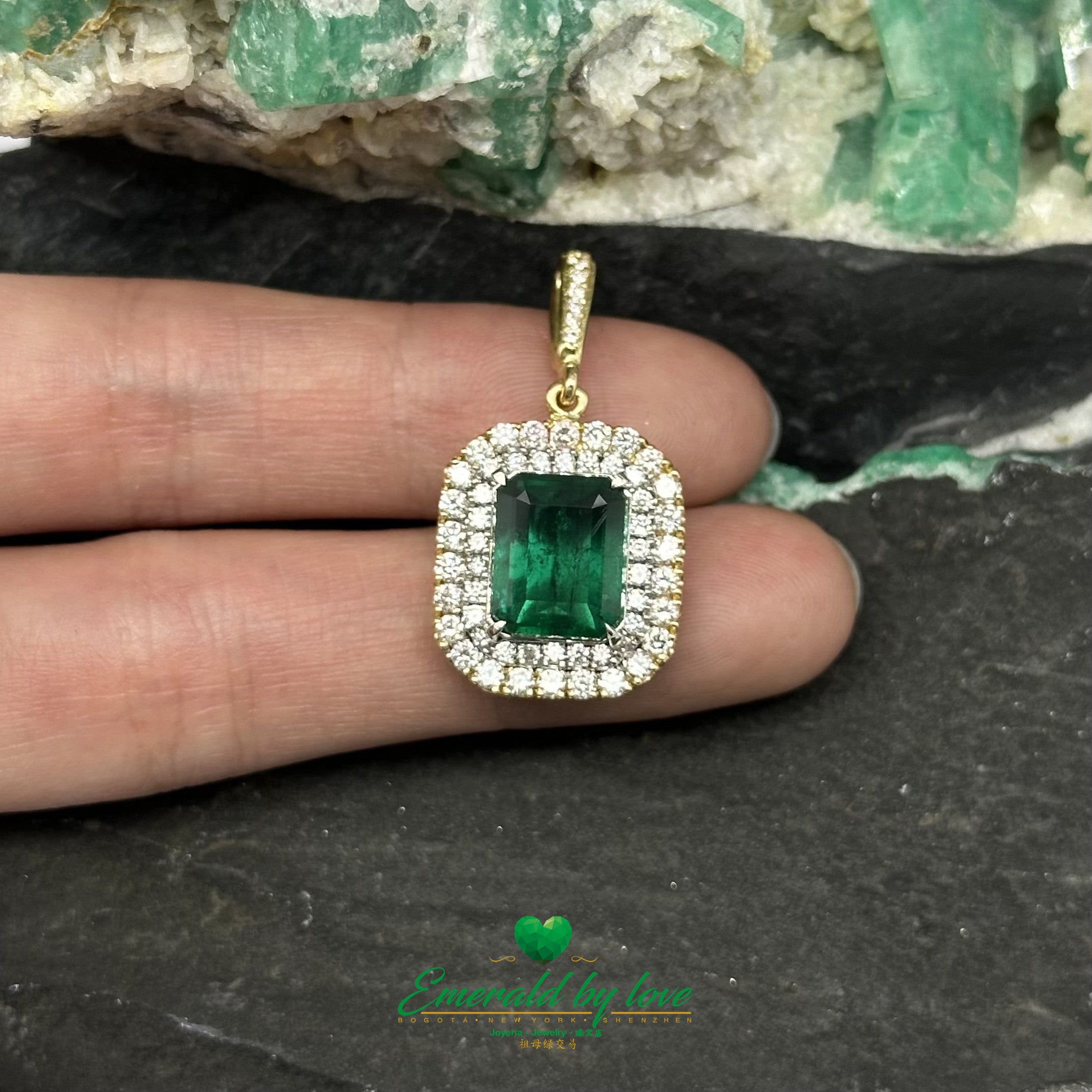 Exquisite Yellow Gold Marquise Pendant with Emerald Cut Emerald and Diamond Halo