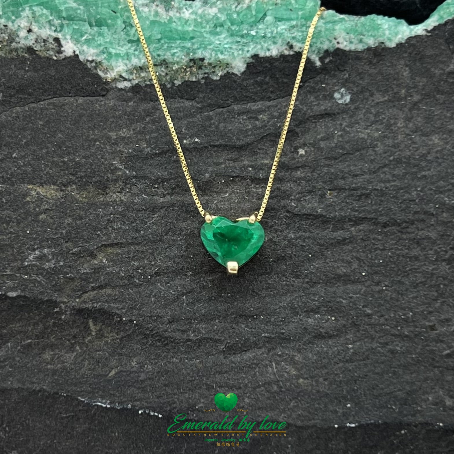 Delicate and beautiful Yellow Gold Heart Emerald Pendant with Three-Prong Setting