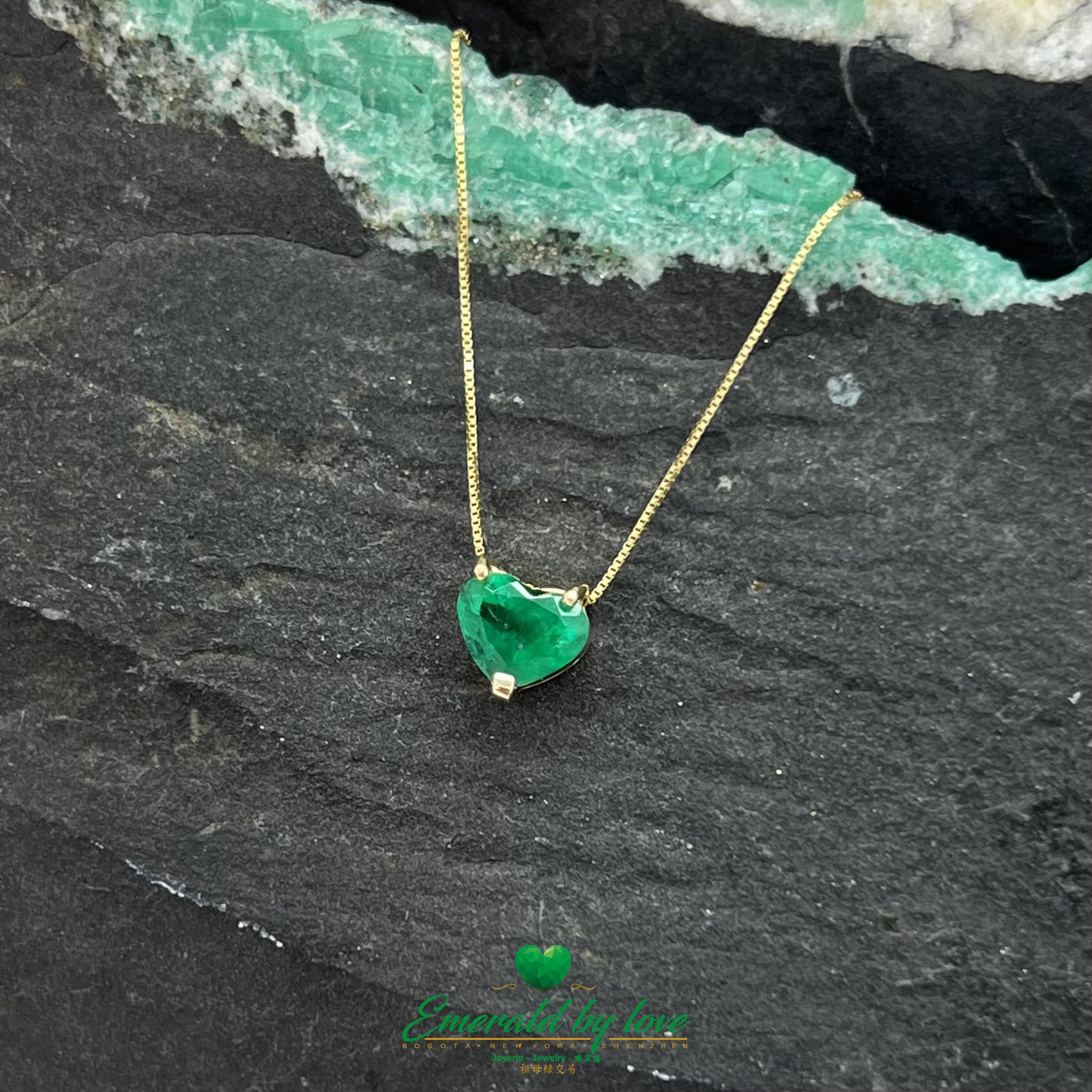 Delicate and beautiful Yellow Gold Heart Emerald Pendant with Three-Prong Setting