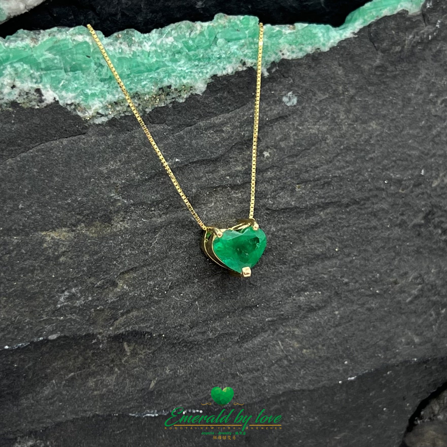 Delicate and beautiful Yellow Gold Heart Emerald Pendant with Three-Prong Setting