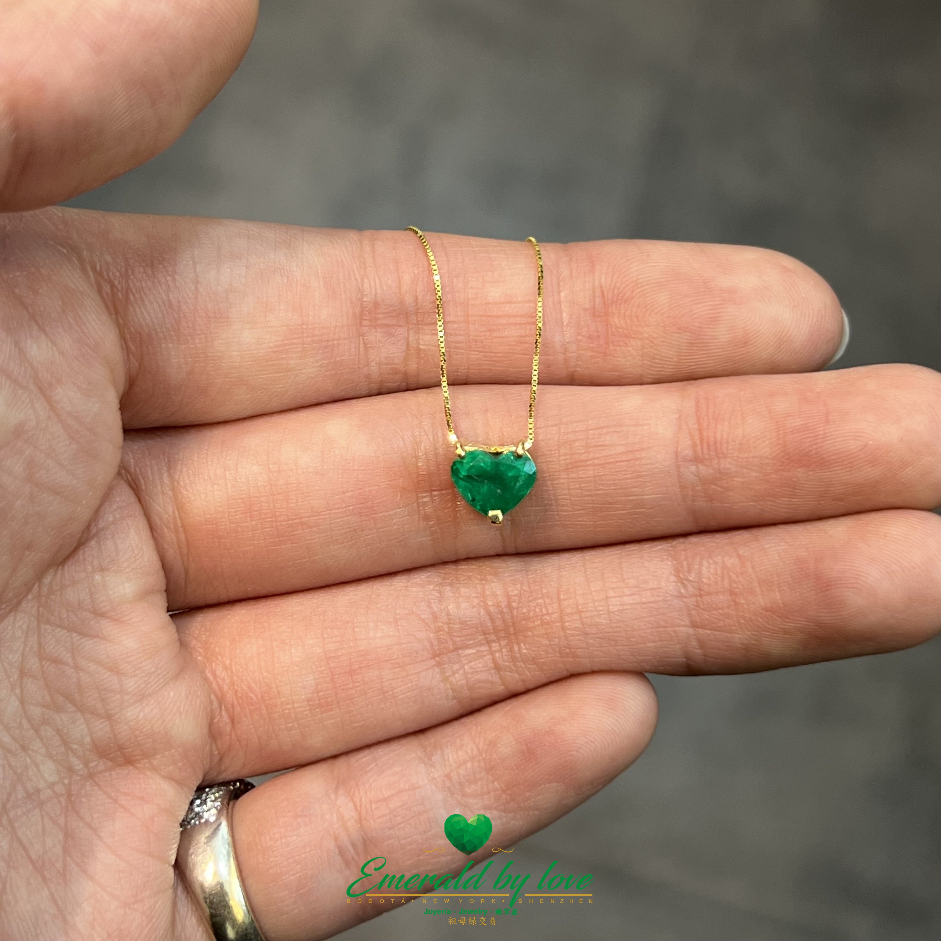 Delicate and beautiful Yellow Gold Heart Emerald Pendant with Three-Prong Setting