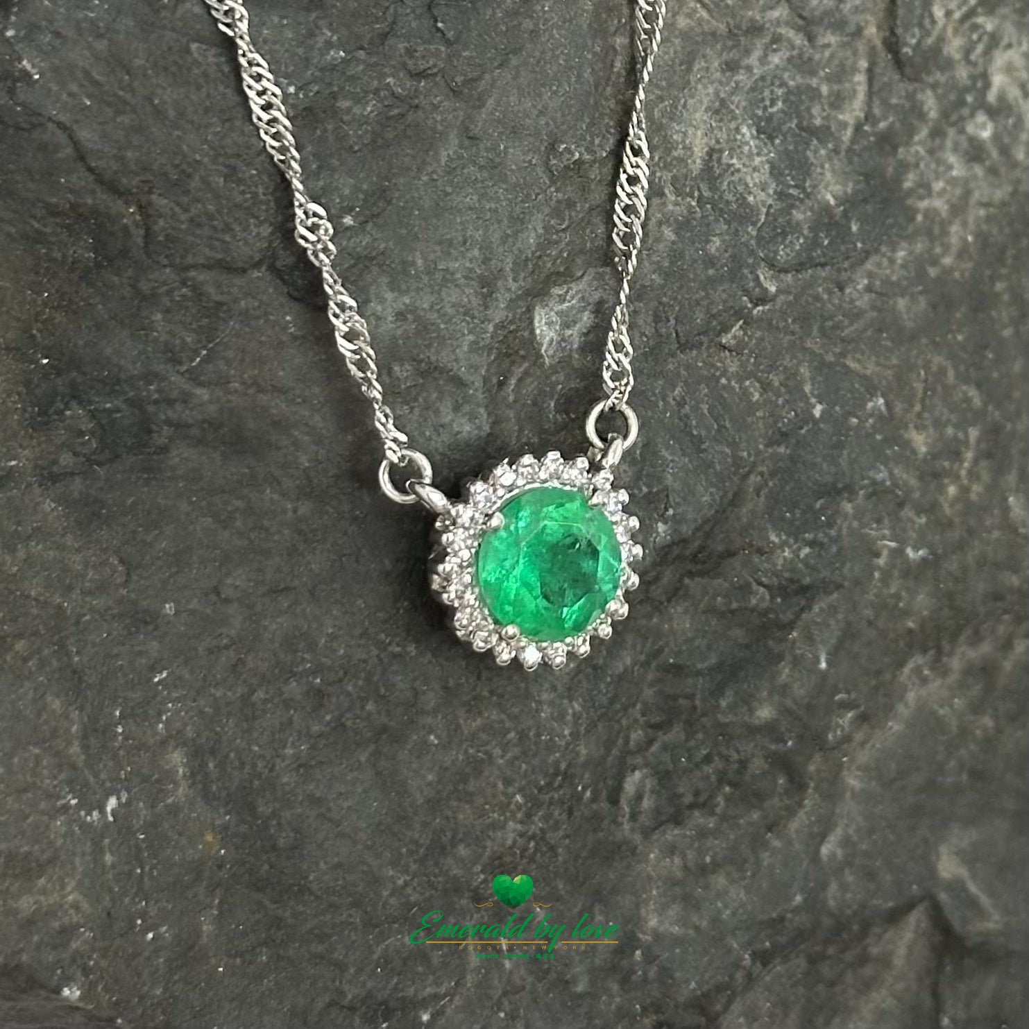 Floral Round Emerald and Diamond Halo Pendant in 18K White Gold