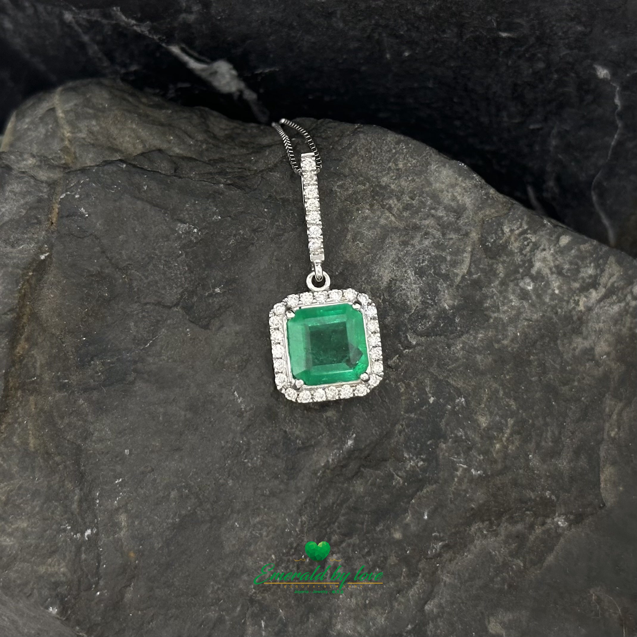 Elegant Emerald-Cut Colombian Emerald Pendant in 18K White Gold with Diamond Halo and Bail Accents